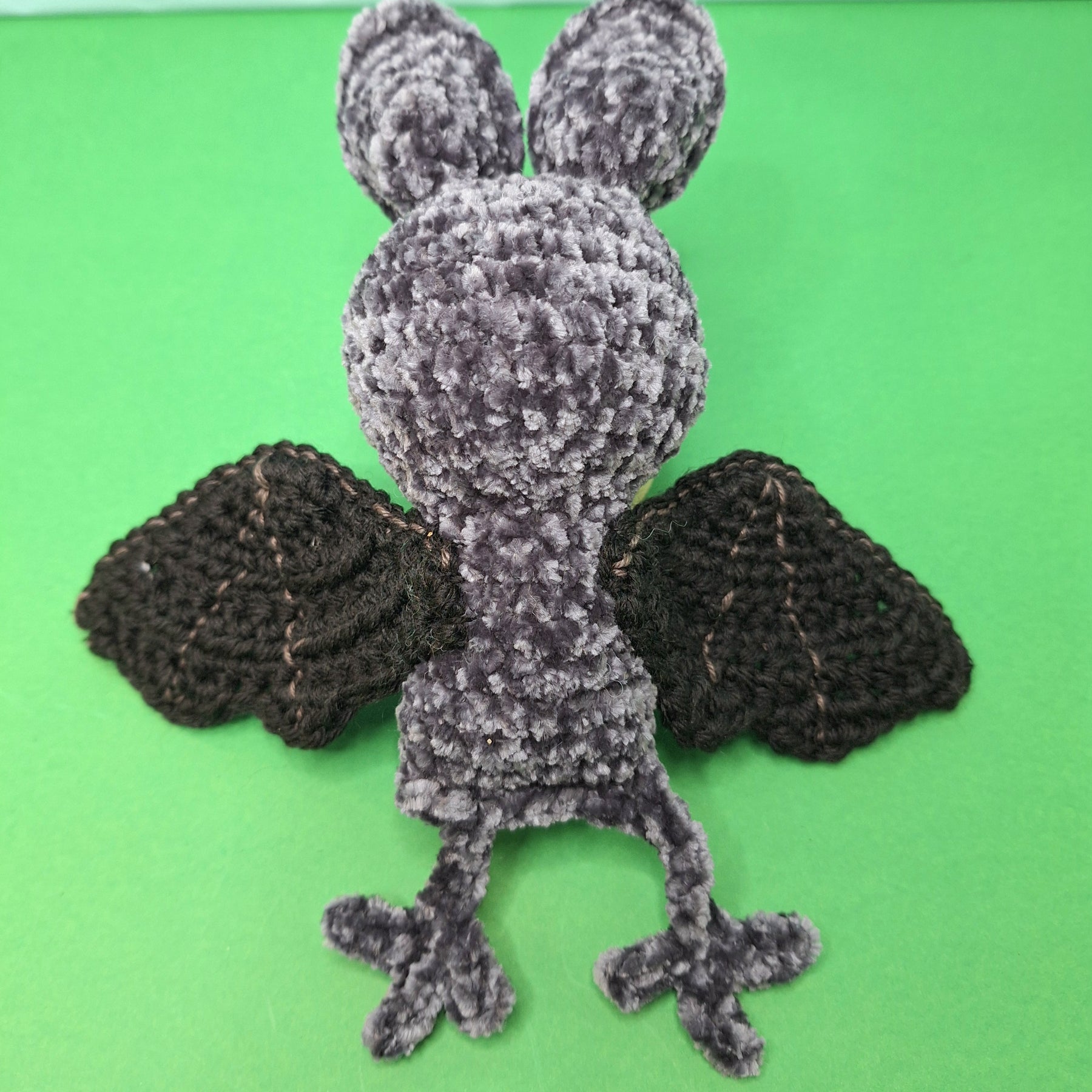 Soft, grey velvet crocheted fruit bat
