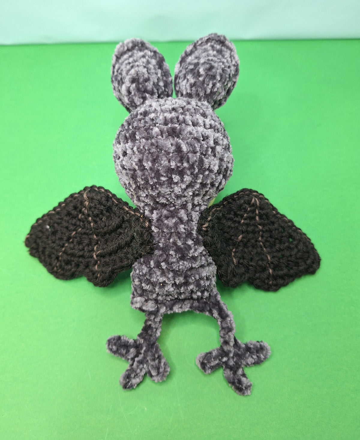 Soft, grey velvet crocheted fruit bat