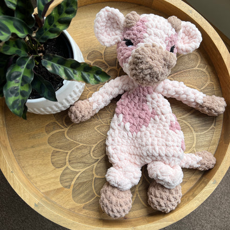 Handmade pink crochet cow lovey snuggler baby safe.