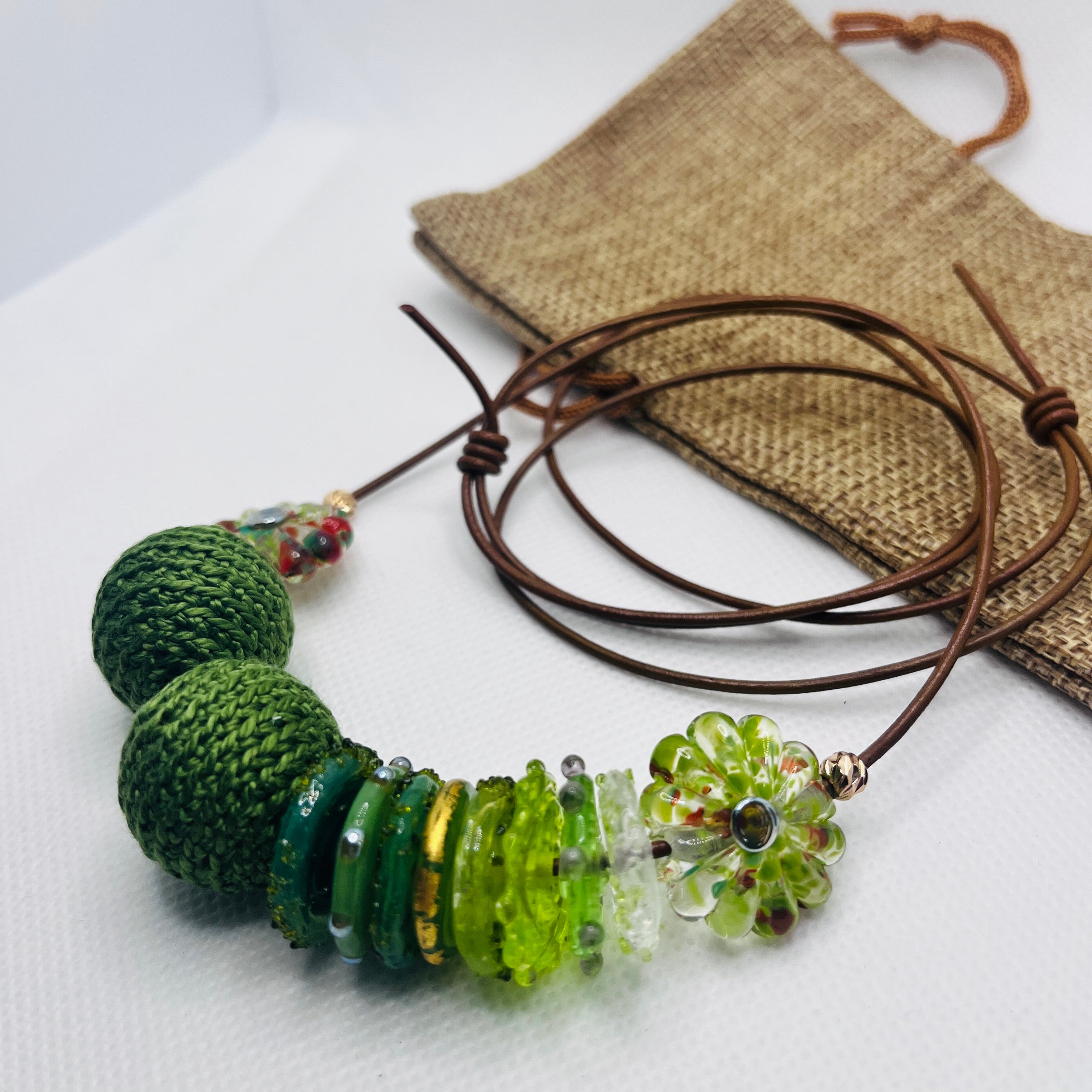 Handmade strand necklace - crochet and glass