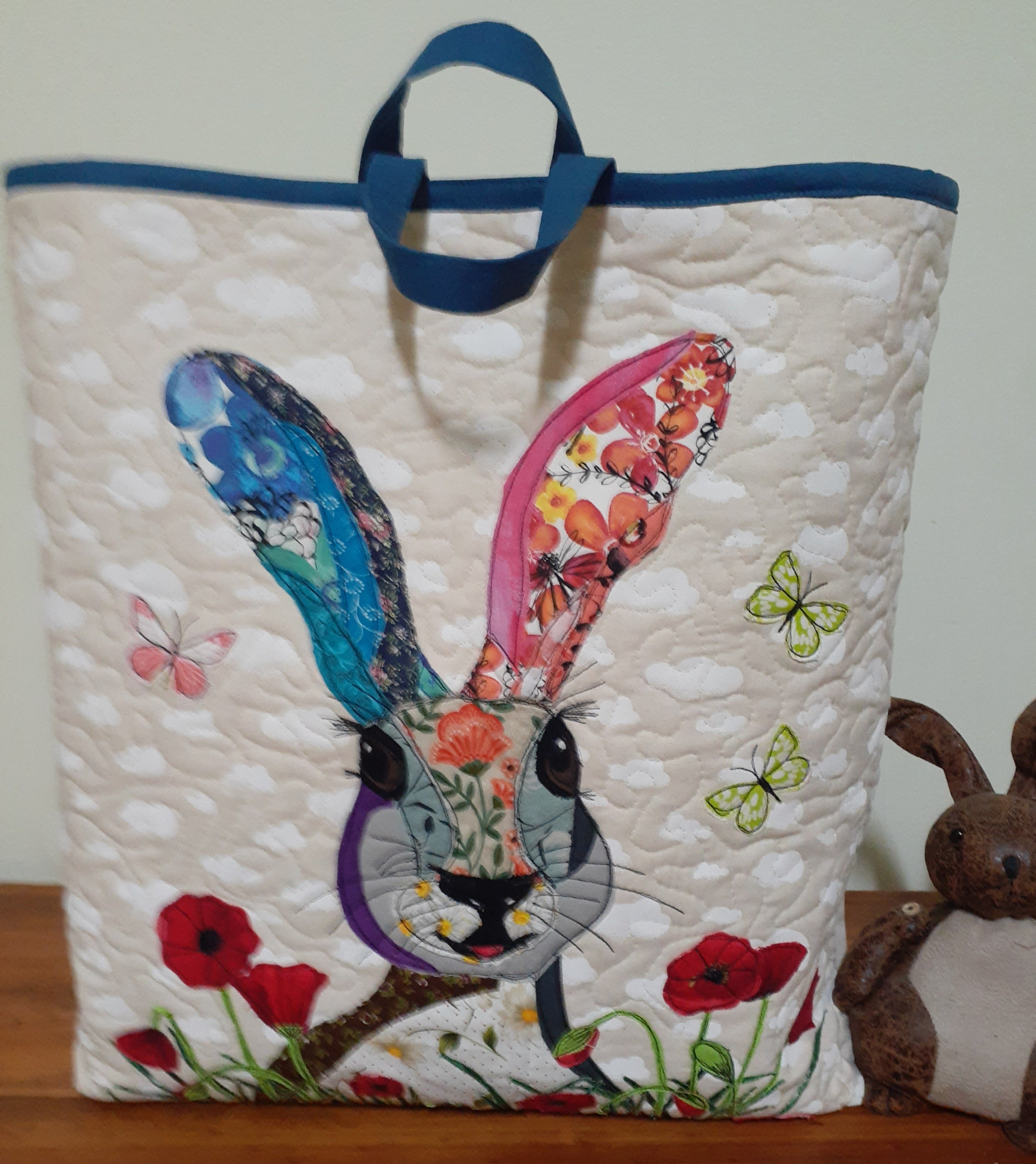 Harriett the hare in the poppy field tote bag