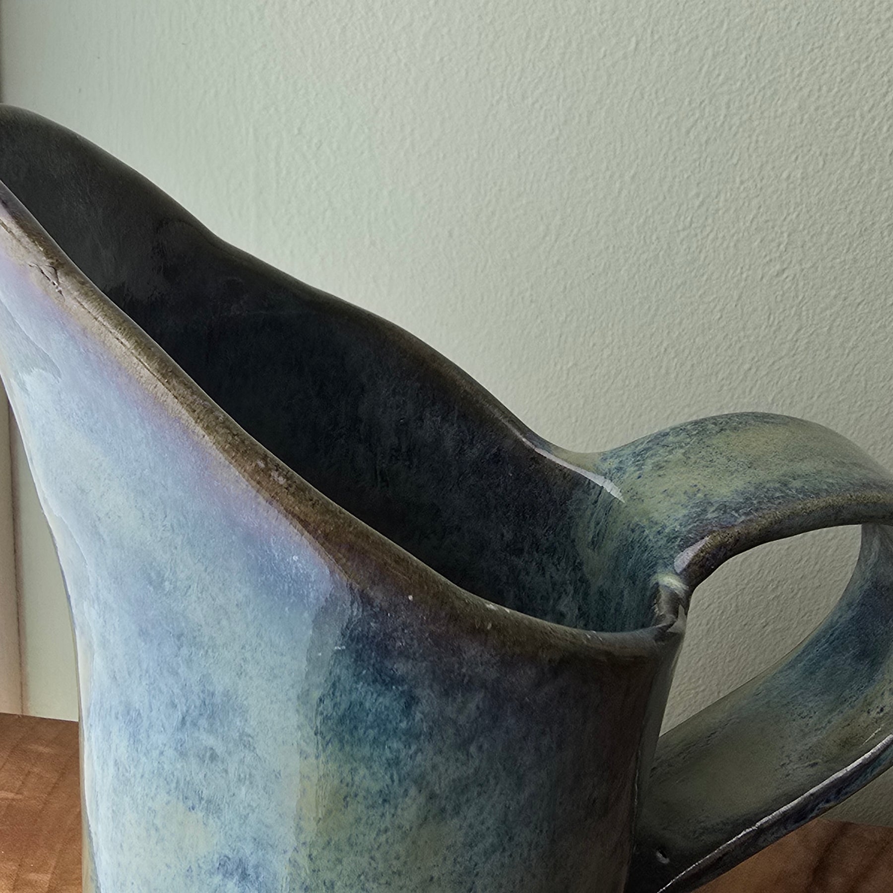 Large blue-green ceramic jug