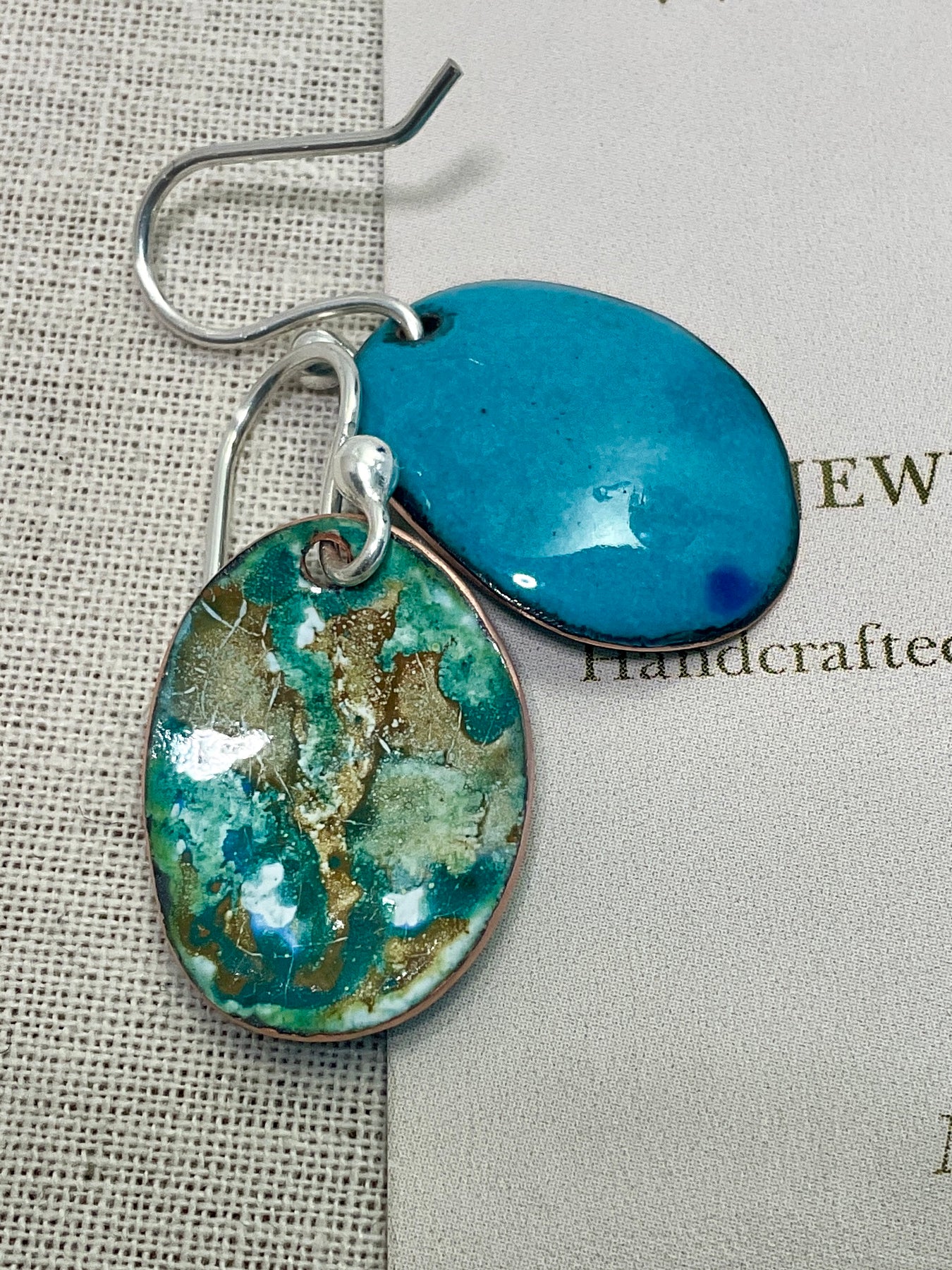Blue and earthy brown oval abstract enamel earrings. Handmade