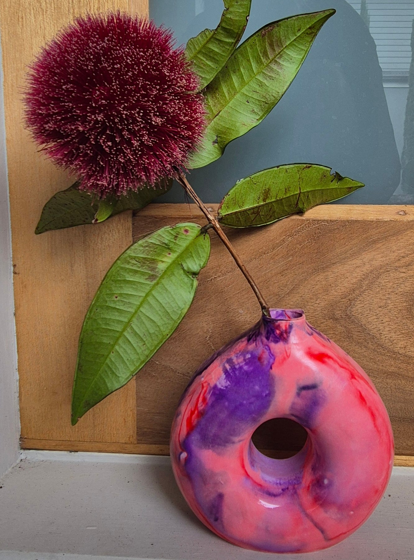 Red and purple concrete donut vase