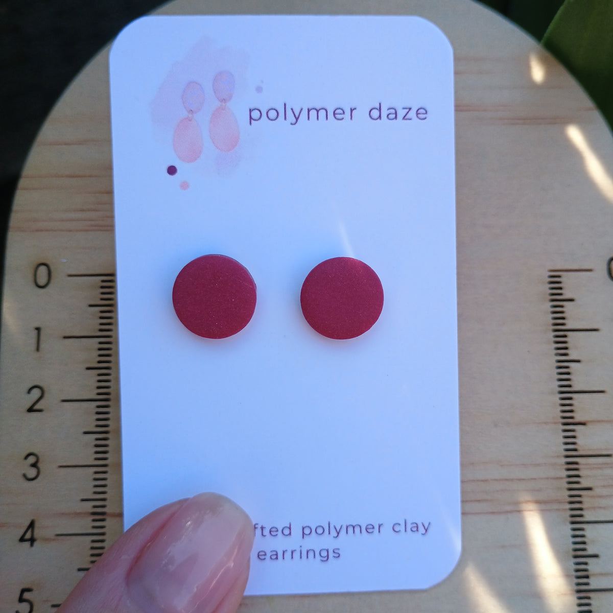 Burgundy stud earrings