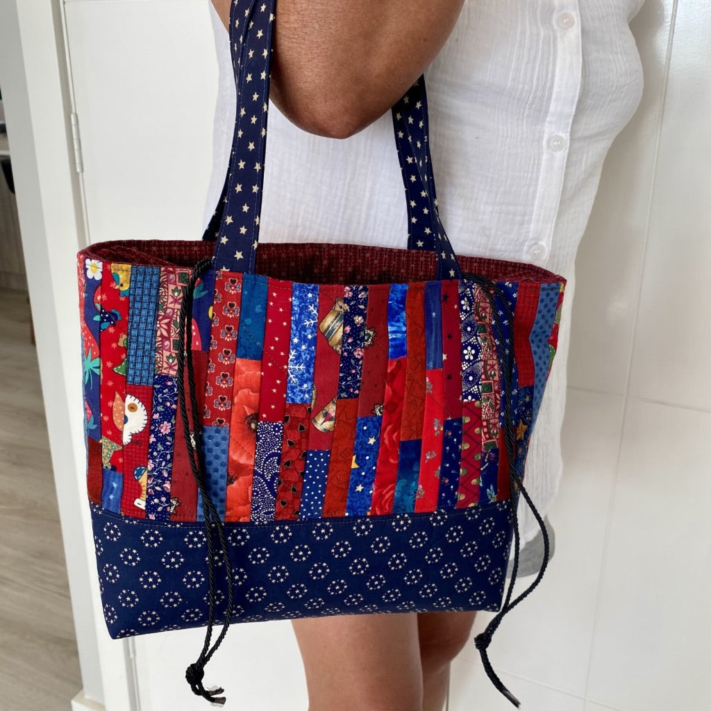Navy and red strip pieced drawstring tote bag
