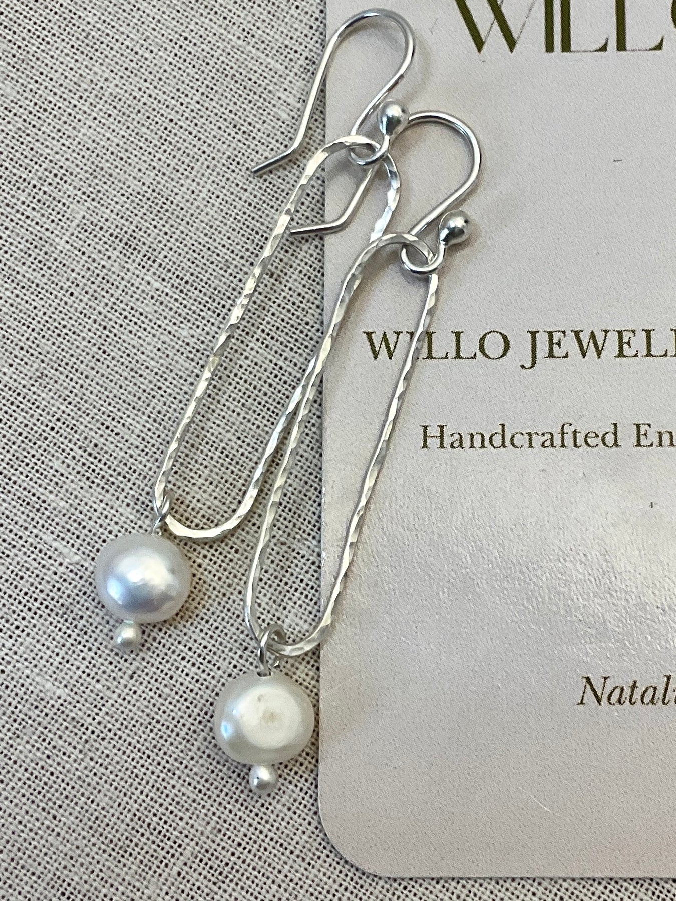 Pearl and Argentium silver earrings.