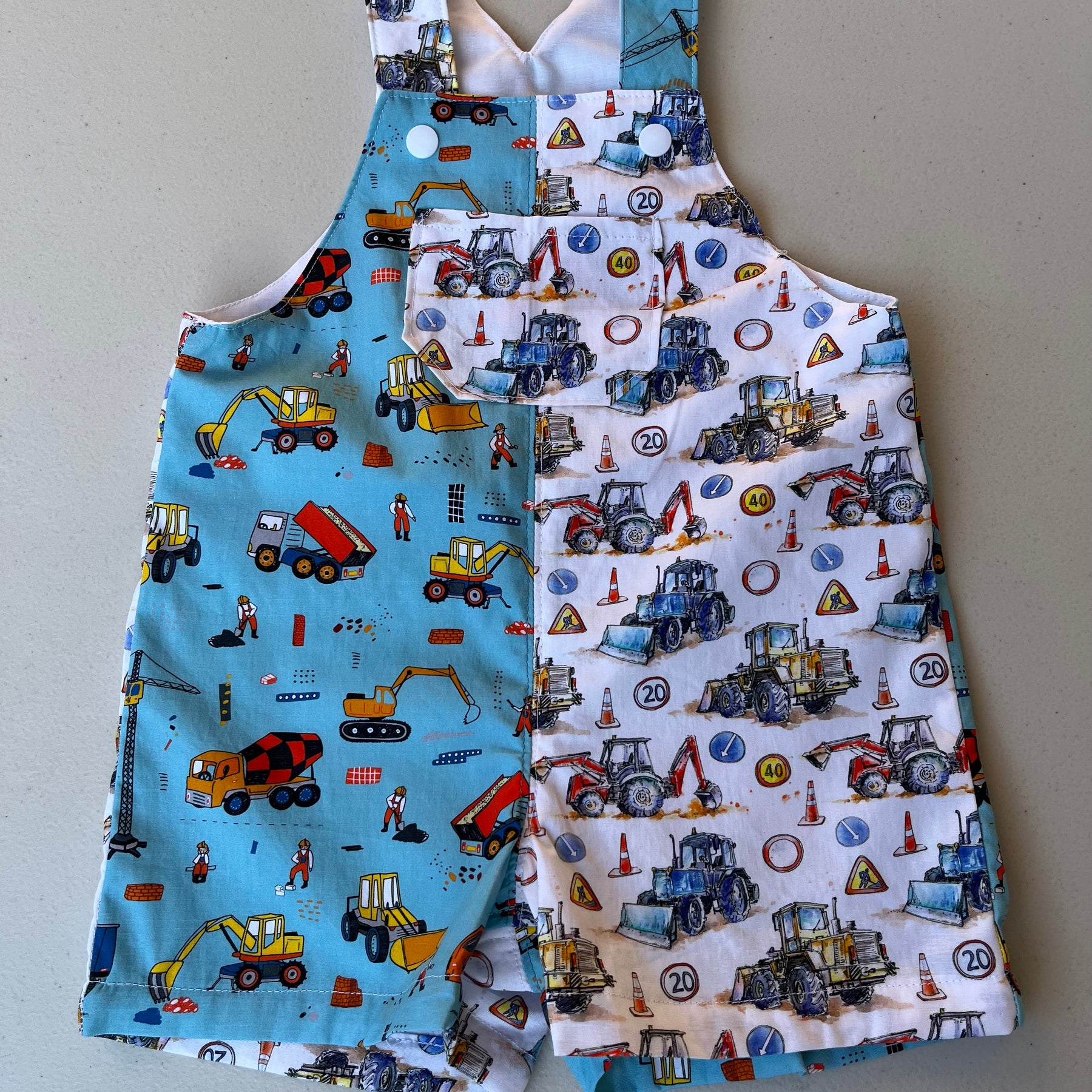 baby overalls/shorts | construction trucks