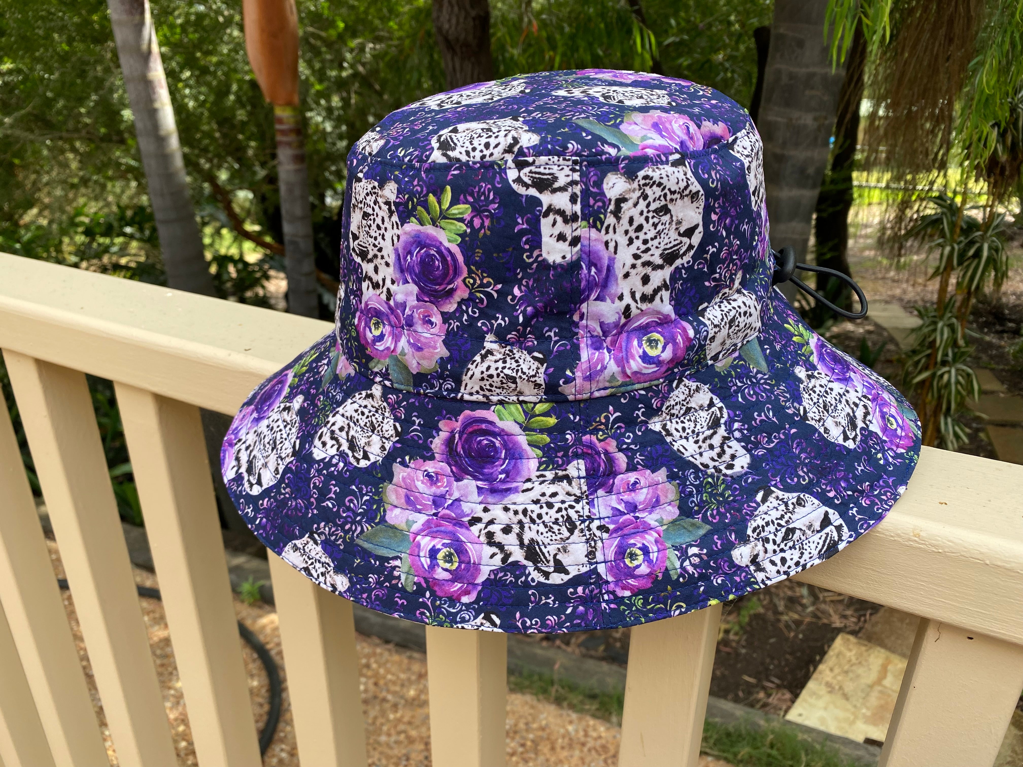 Large Adult Bucket Hat Snow Leopard Floral on Navy
