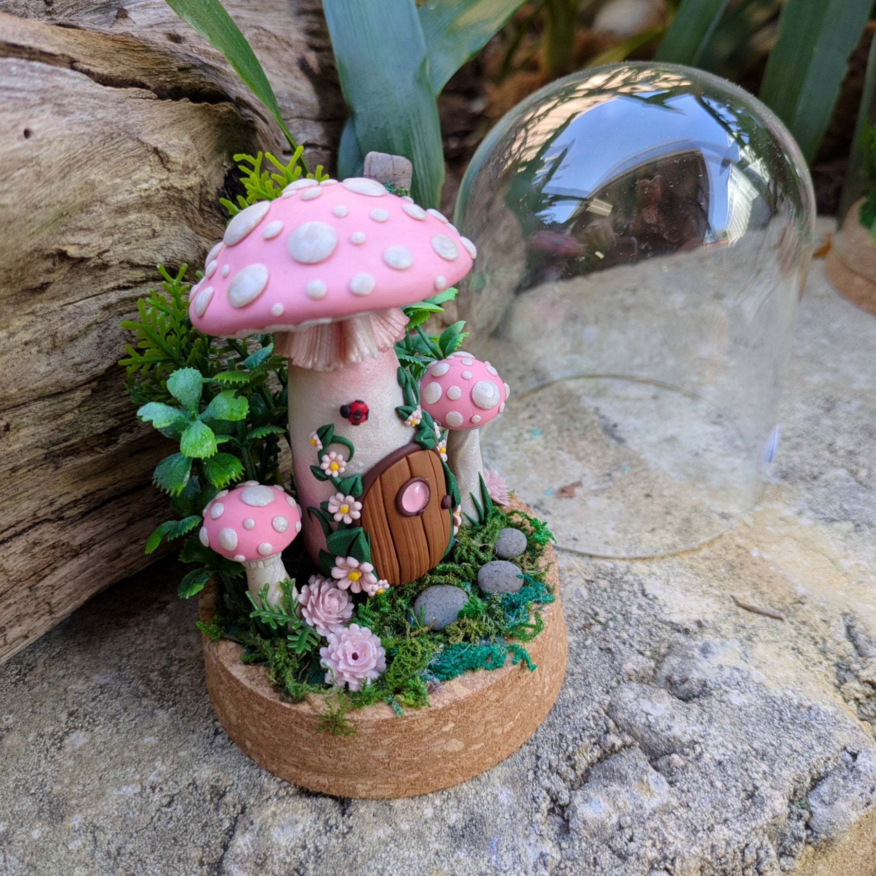 Pink Fairy Mushroom Houses in glass domes