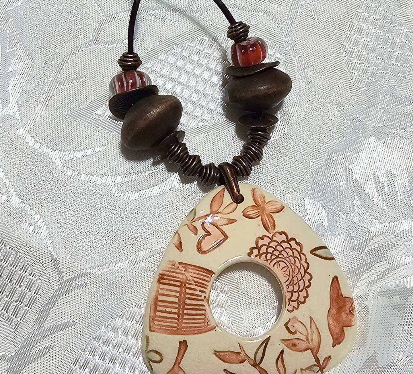 Triangular Handcrafted Ceramic Pendant Suspended on Black Adjustable Cord FREE POST