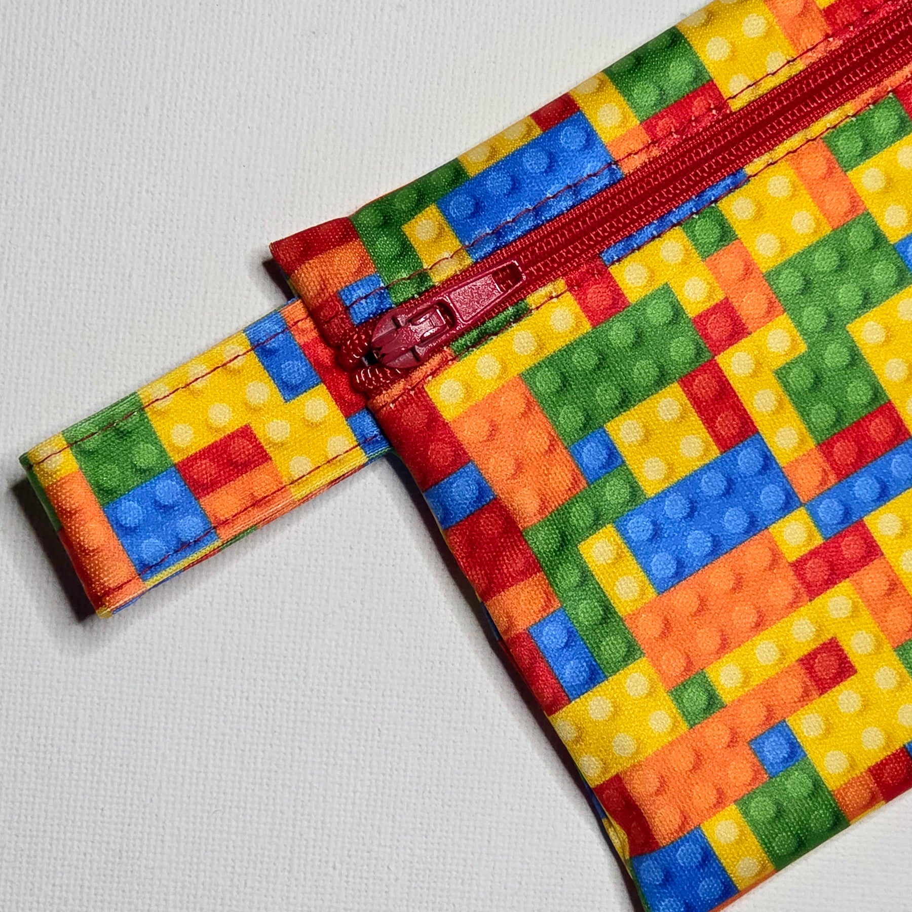 Mini Wet Bag, Colourful Building Block fabric, 15cms x 10cms