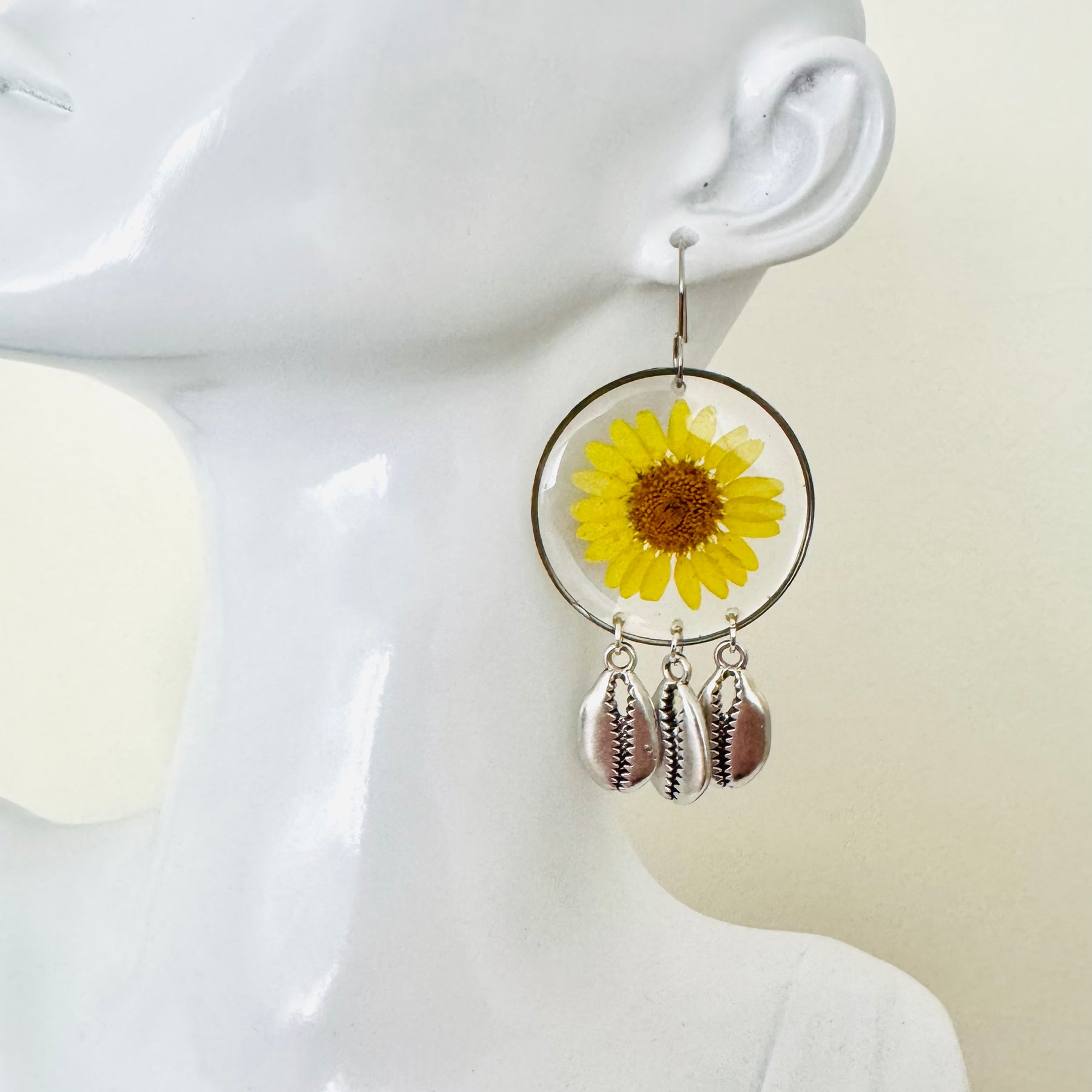Yellow daisy and shell resin earrings