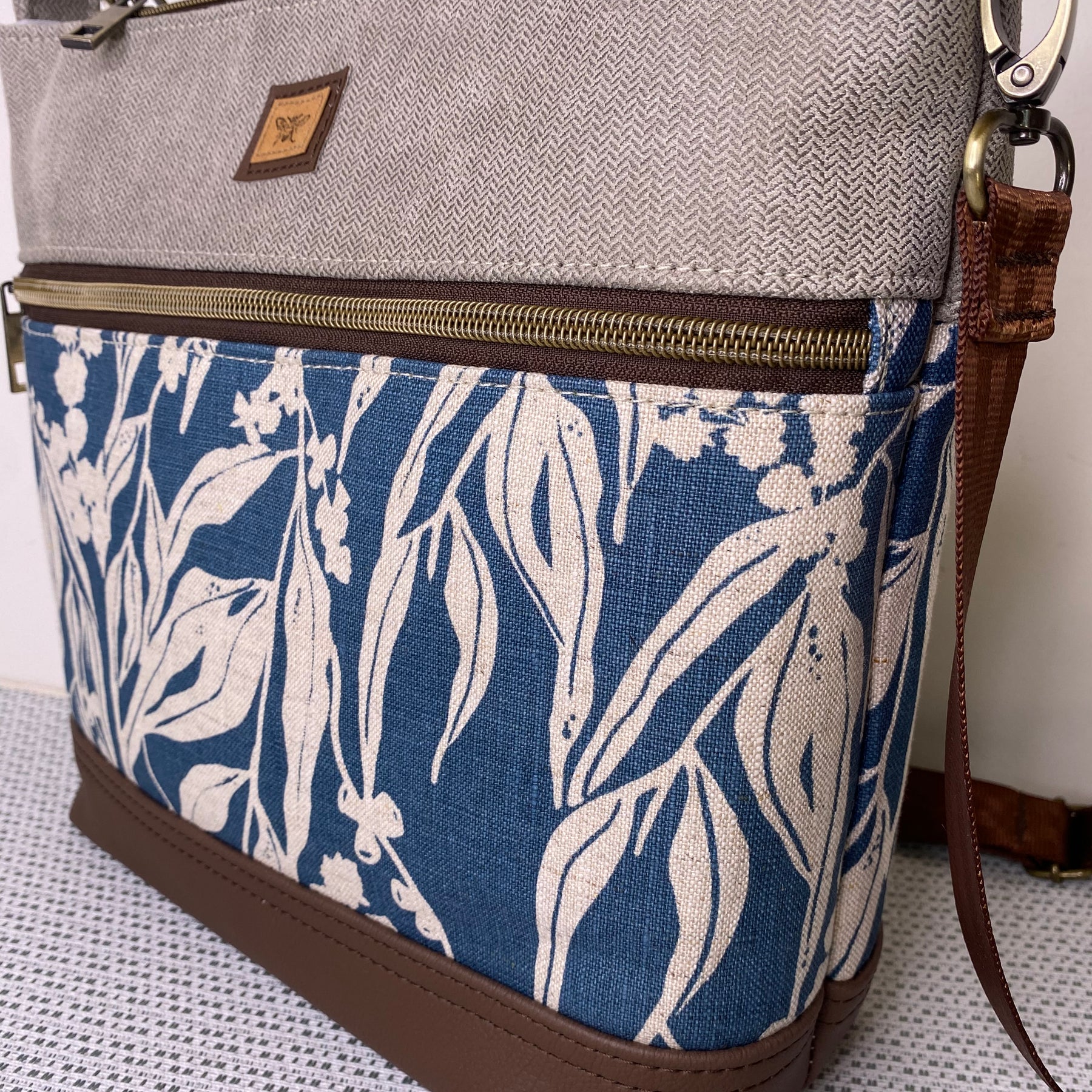 Lola Crossbody Bag - Hand Screen Printed Linen in Blue Gum leaves and Beige Fabric with Dark BrownFaux Leather Base