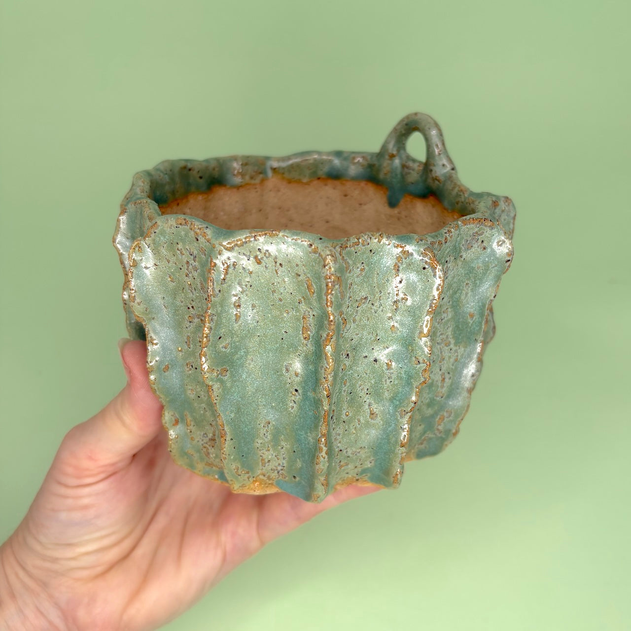 Ceramic orchid pot with ridges