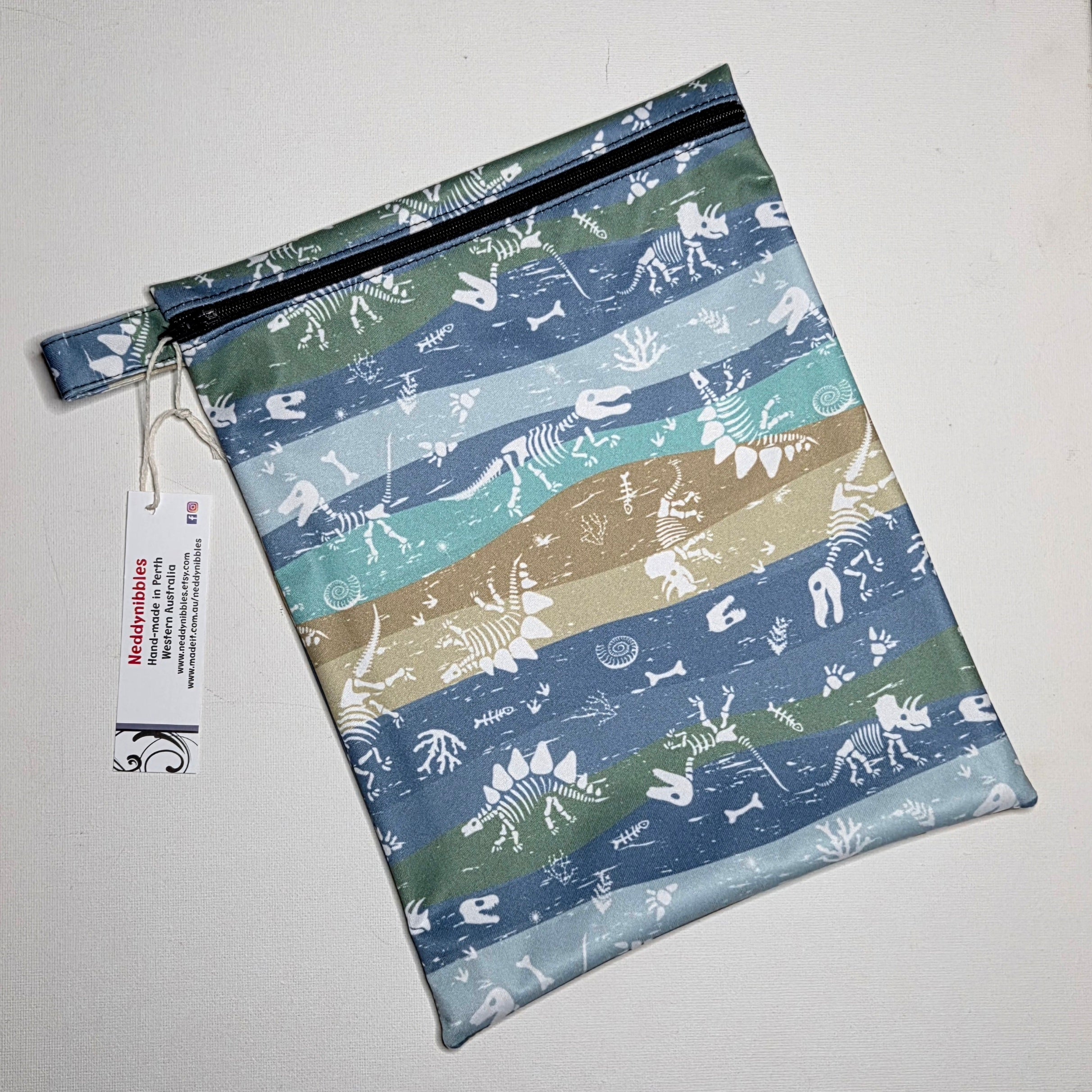 Medium Wet Bag with a Dinosaur Bones Design