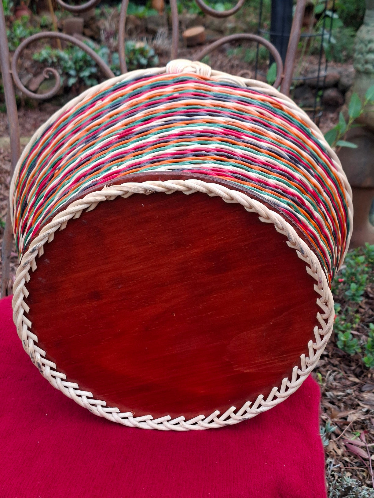 Large Round Market Basket orang, green, black, red, and natural.