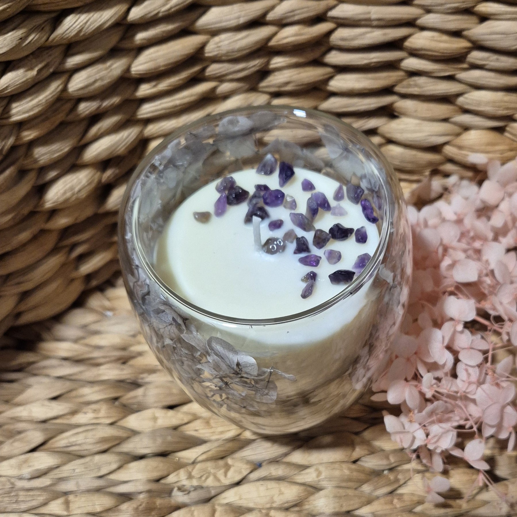 Glass container candle with lavender and dried hydrangeas