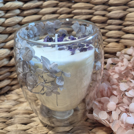 Lavender container candle with dried hydrangea flowers