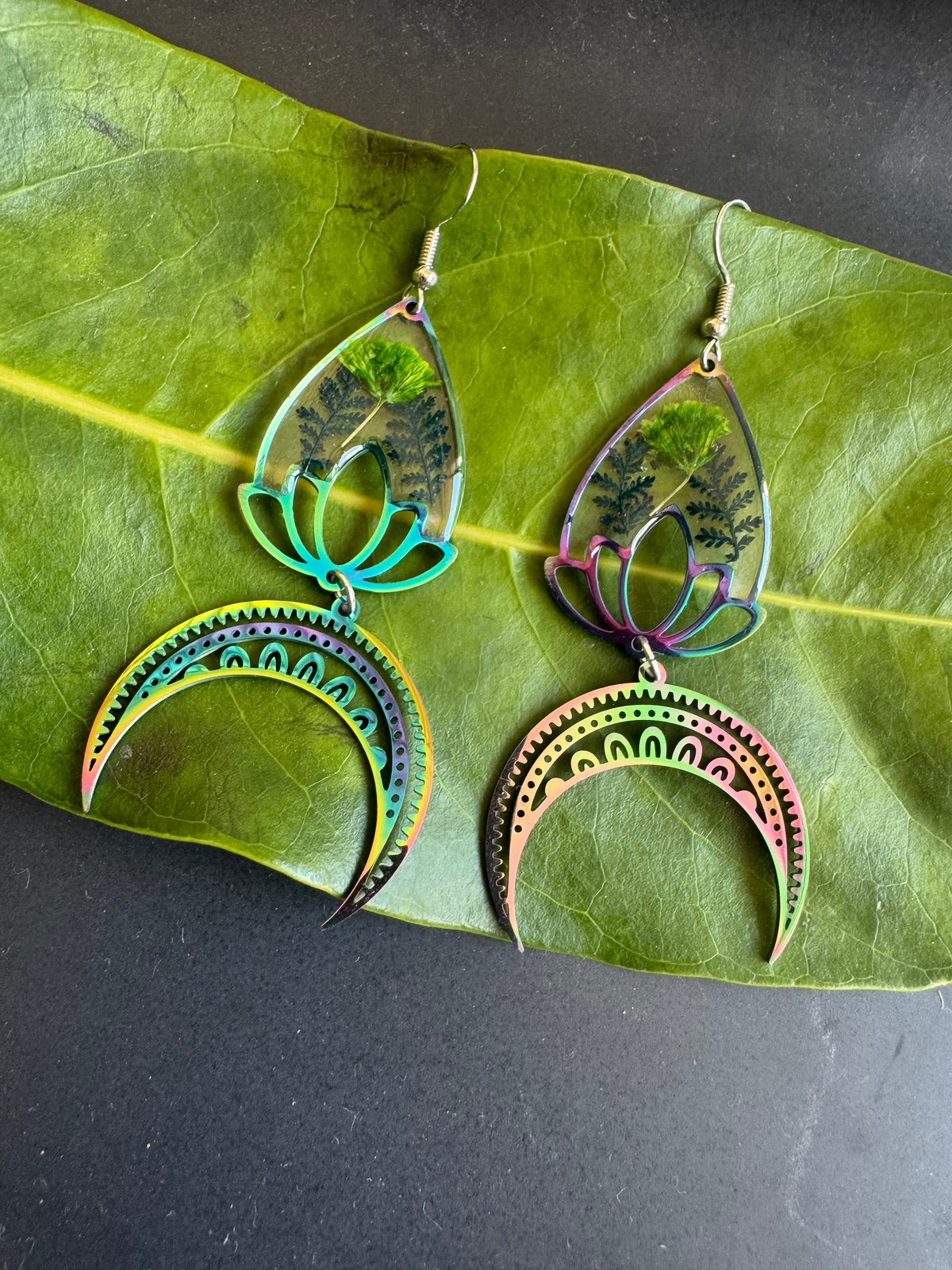 Iridescent rainbow resin earrings with pressed flowers