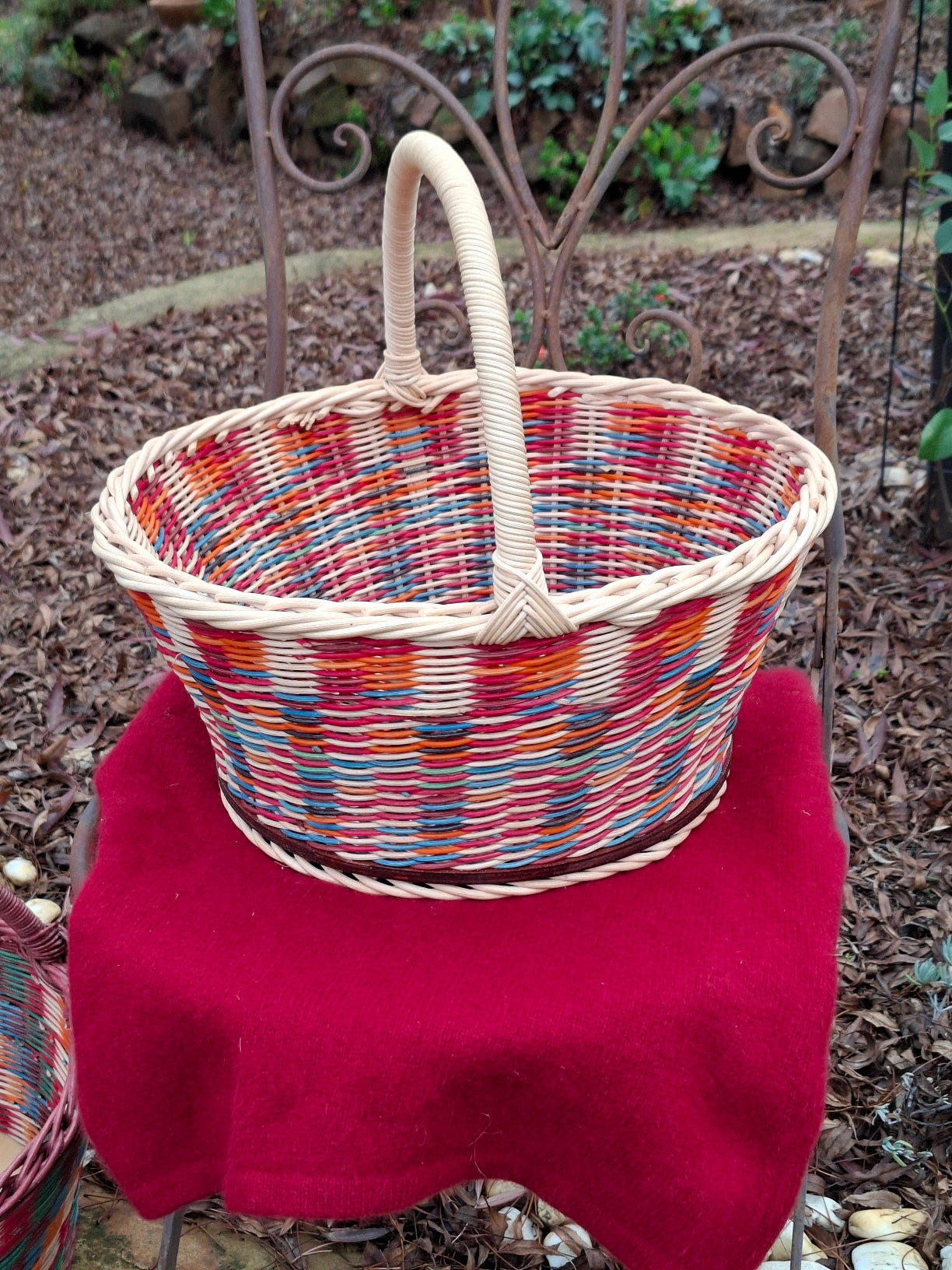 Large Round Market Basket brown, blue, orange, red and natural.