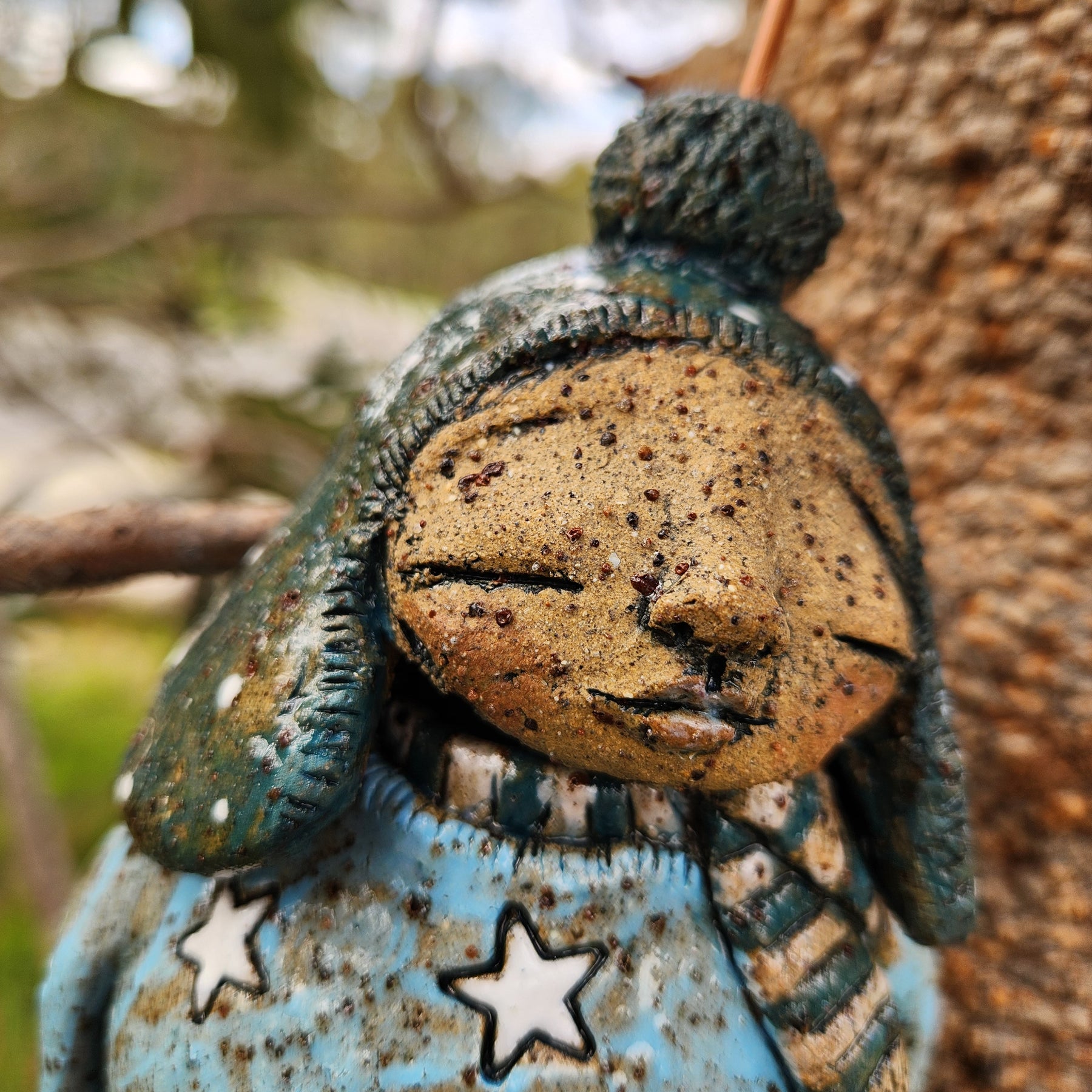 Clay windchime, little girl, stars, spots