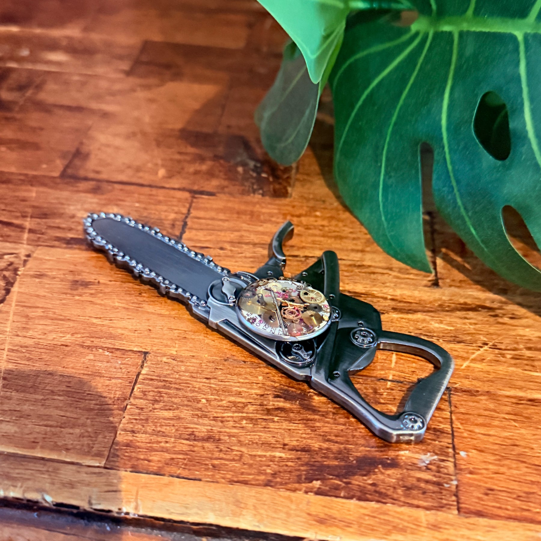 Steampunk watch parts  bottle opener (Chain Saw)