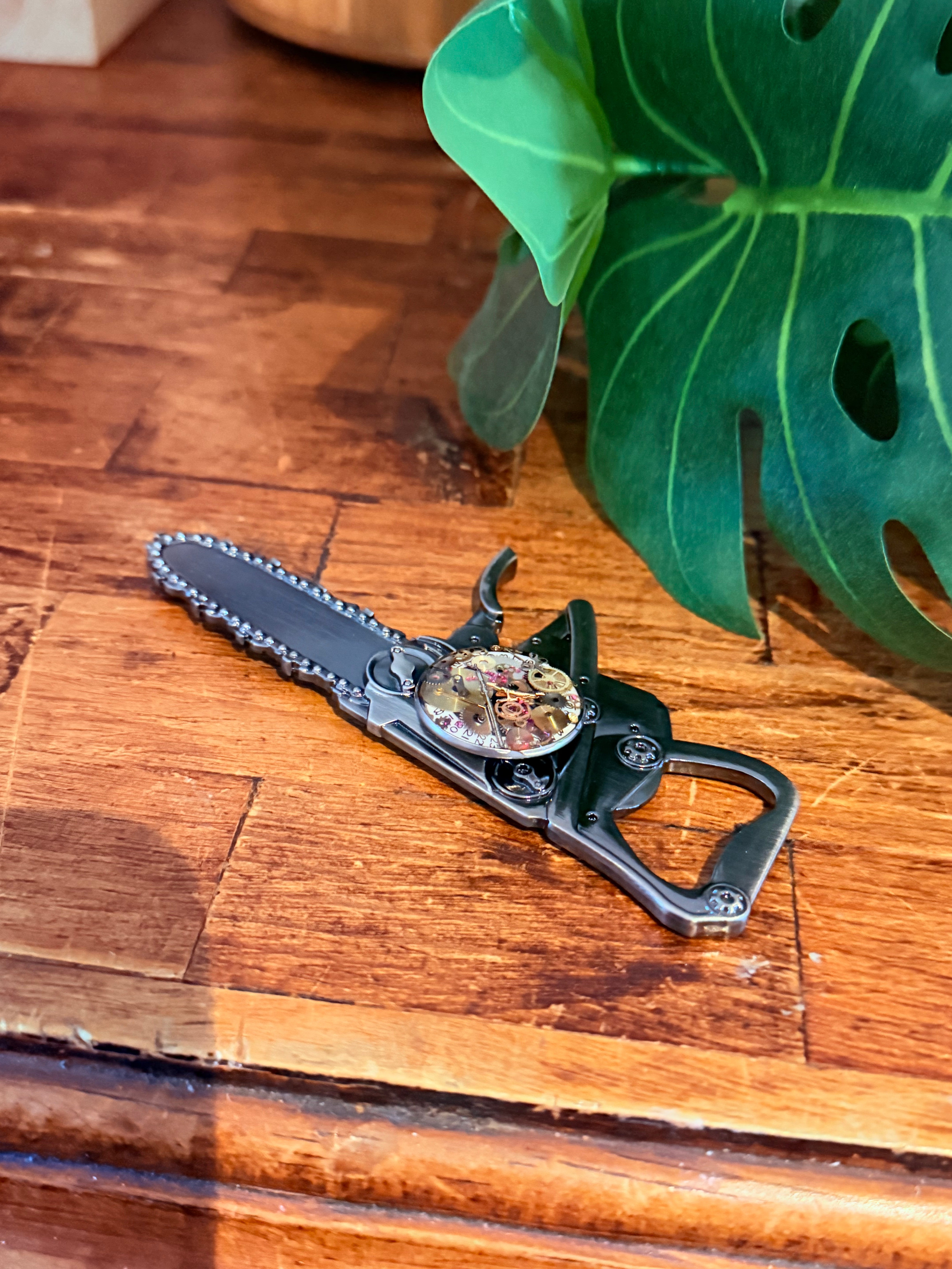 Steampunk watch parts  bottle opener (Chain Saw)