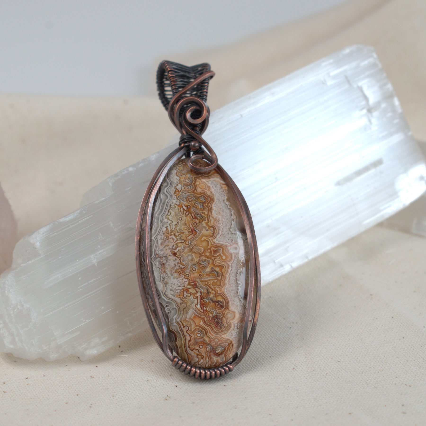 Written in Stone - Crazy Lace Agate Copper Pendant