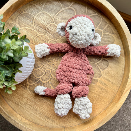 Handmade crochet Mini Monkey modern lovey with knotted legs.