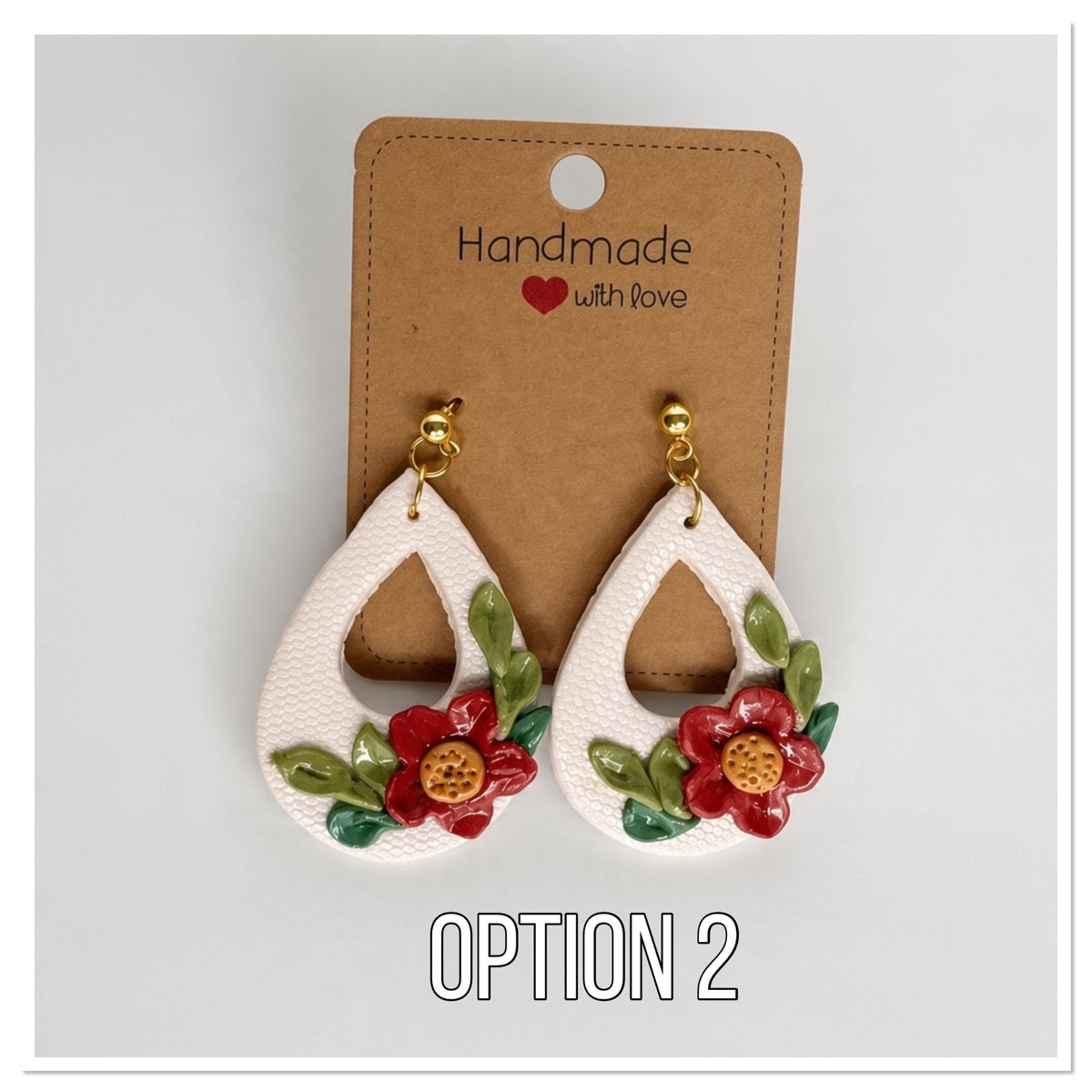 Earthy botanical ivory earrings feature hand-sculpted Flowers