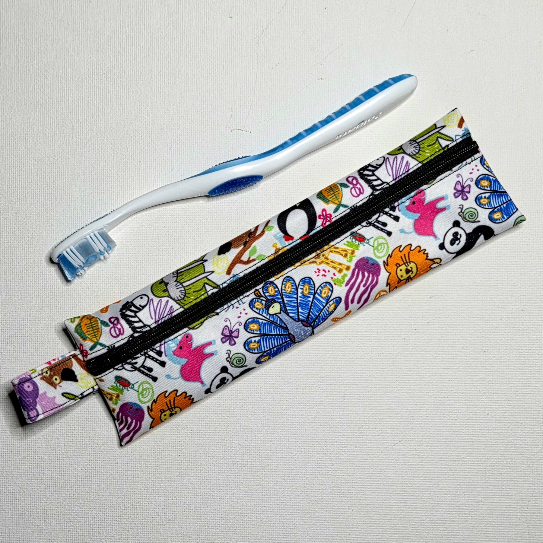 SKINNY Wet Bag, Cute Drawings Fabric, 20cms x 6cms