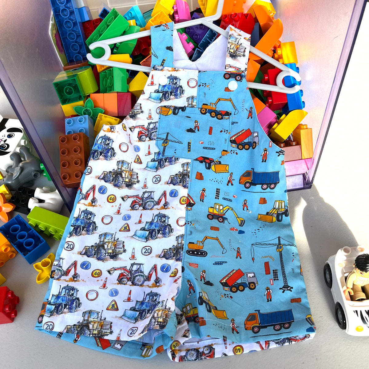 baby overalls/shorts | construction trucks
