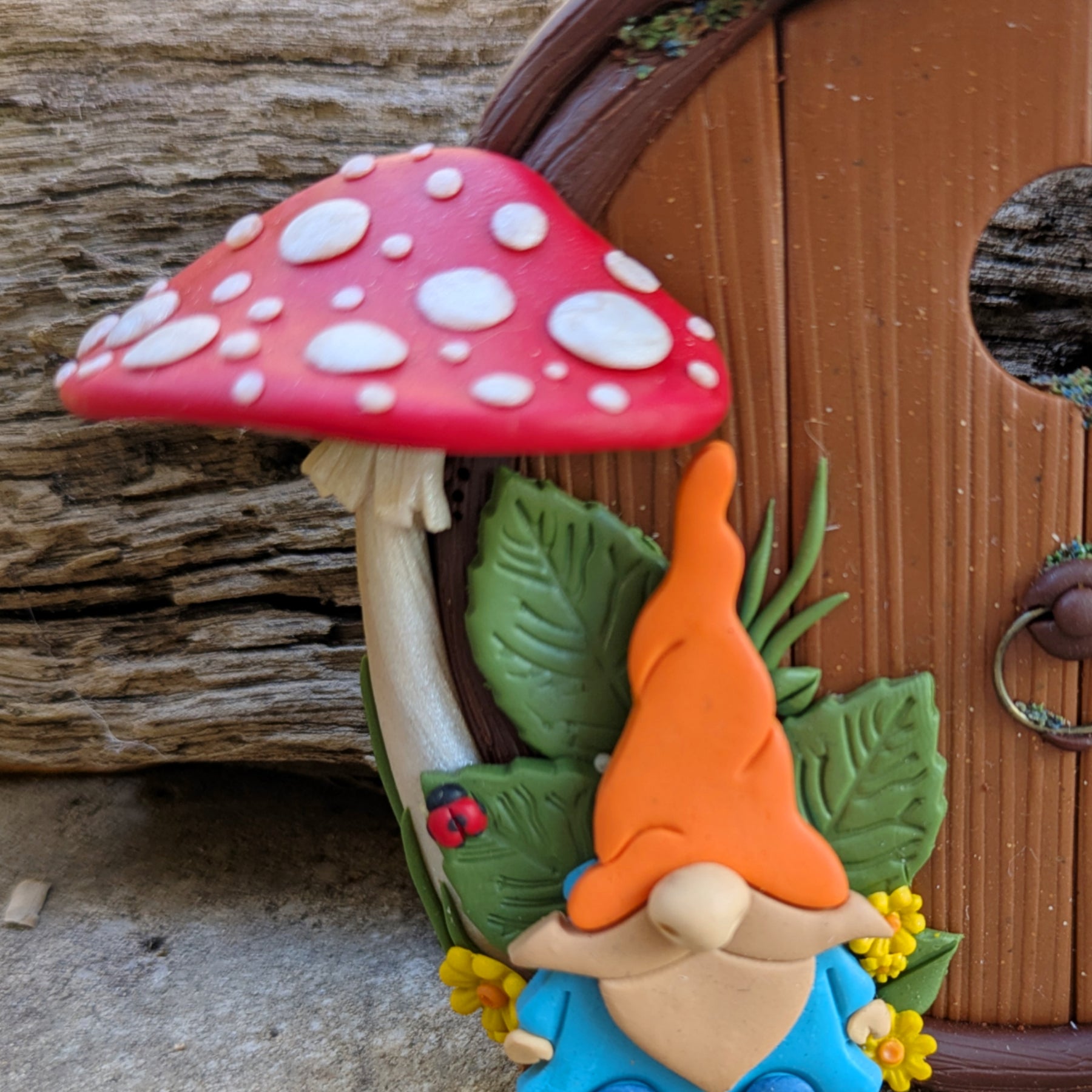 Gnome & Mushroom Fairy Door with a curious snail