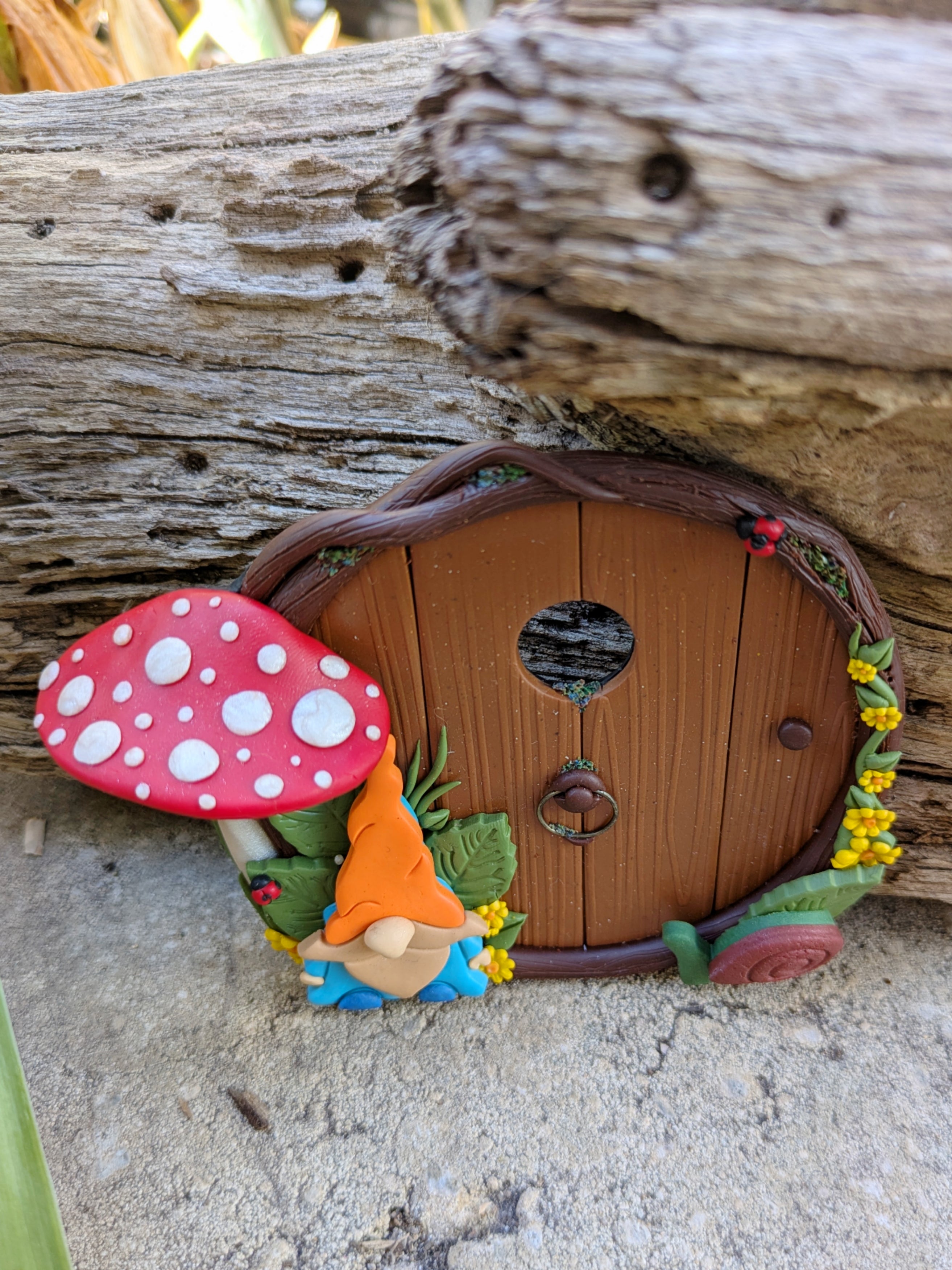 Gnome & Mushroom Fairy Door with a curious snail
