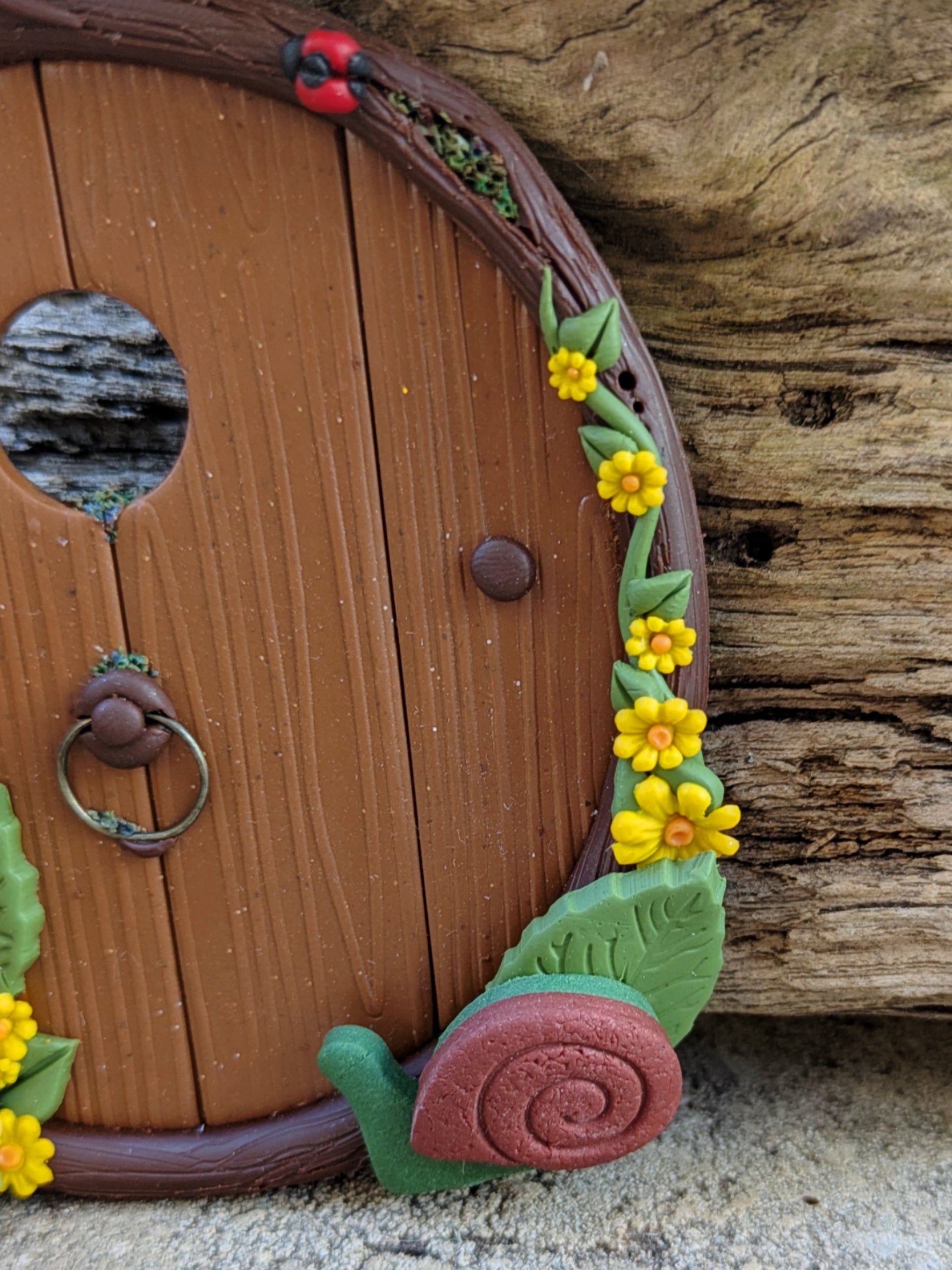 Gnome & Mushroom Fairy Door with a curious snail