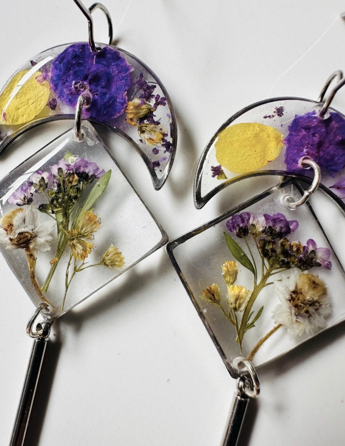 Violet /yellow rhombus and moon resin earrings with pressed flowers