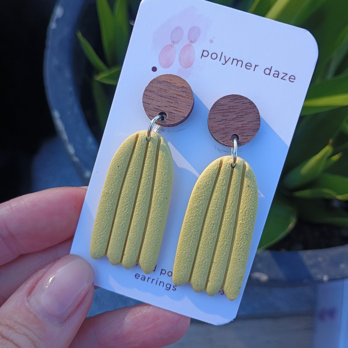 Embossed dangle earrings with natural wood stud