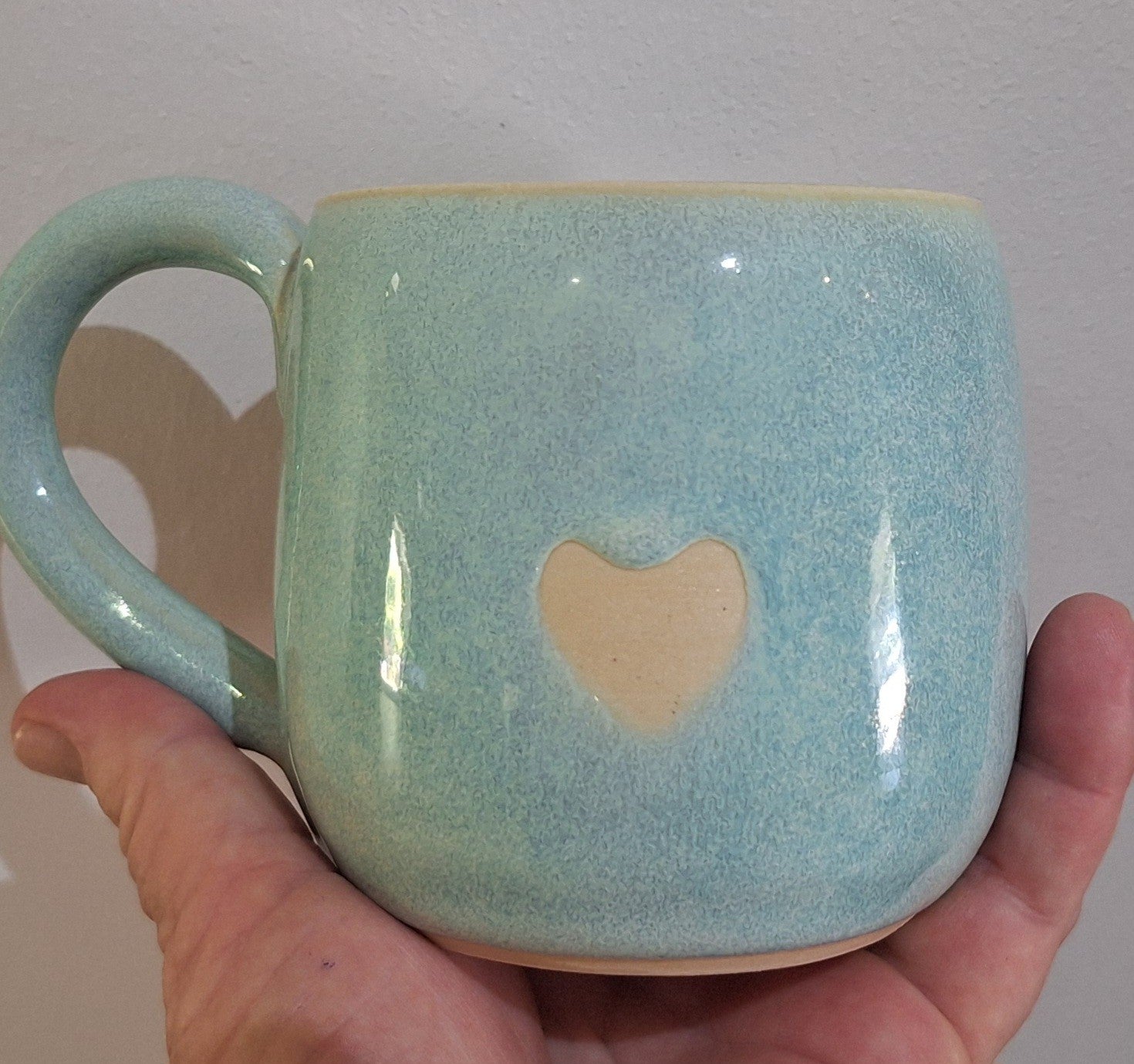 Pottery coffee mug - Green glaze with love heart