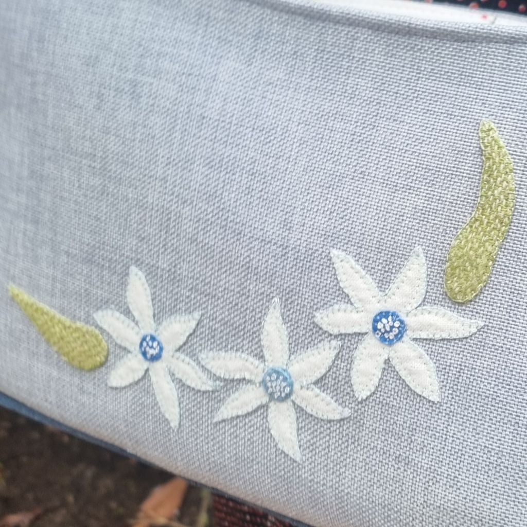 Handmade appliqued crossbody zip bag - blue with flannel flowers