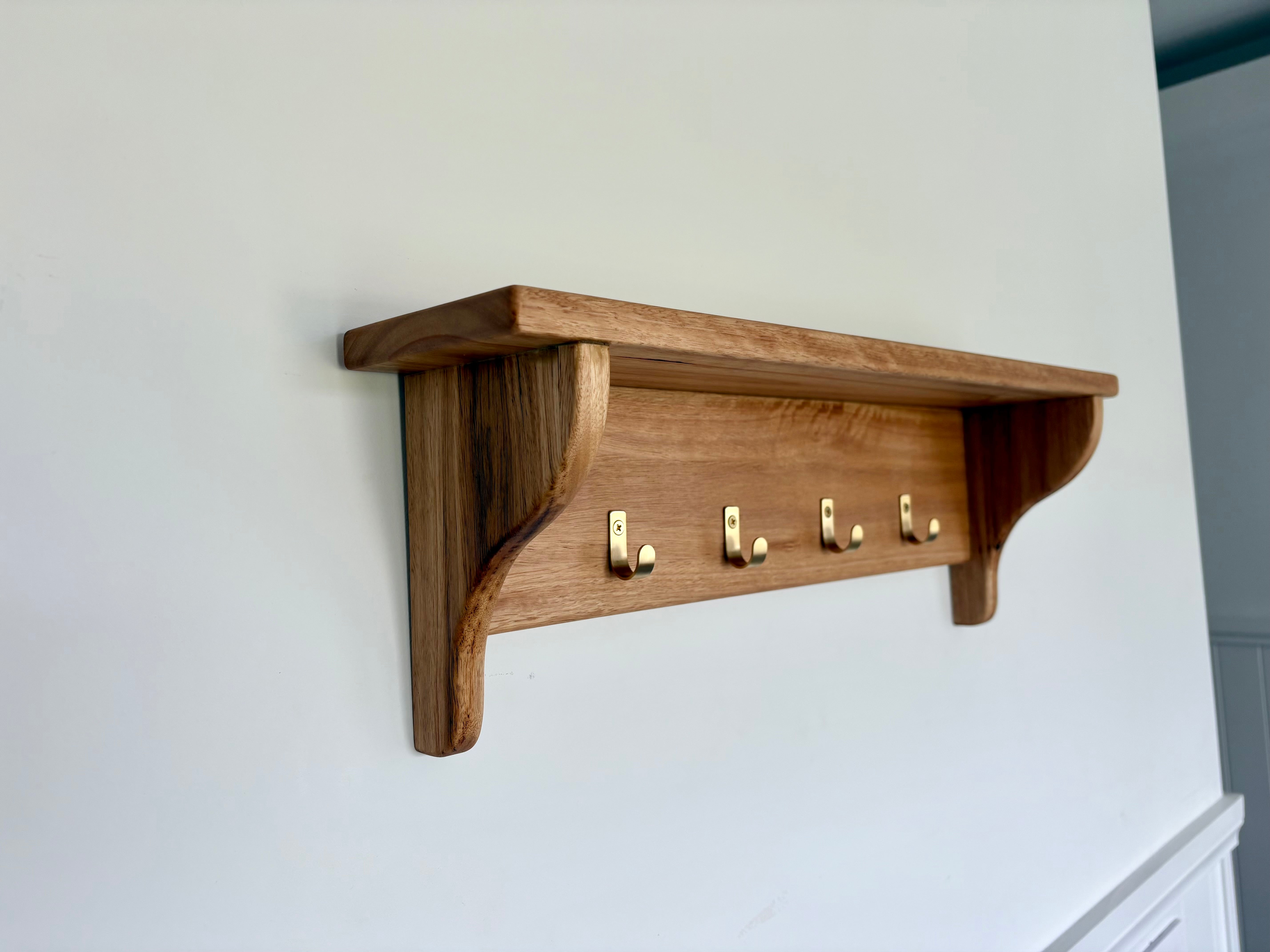 Blackbutt wall shelf with gold hooks