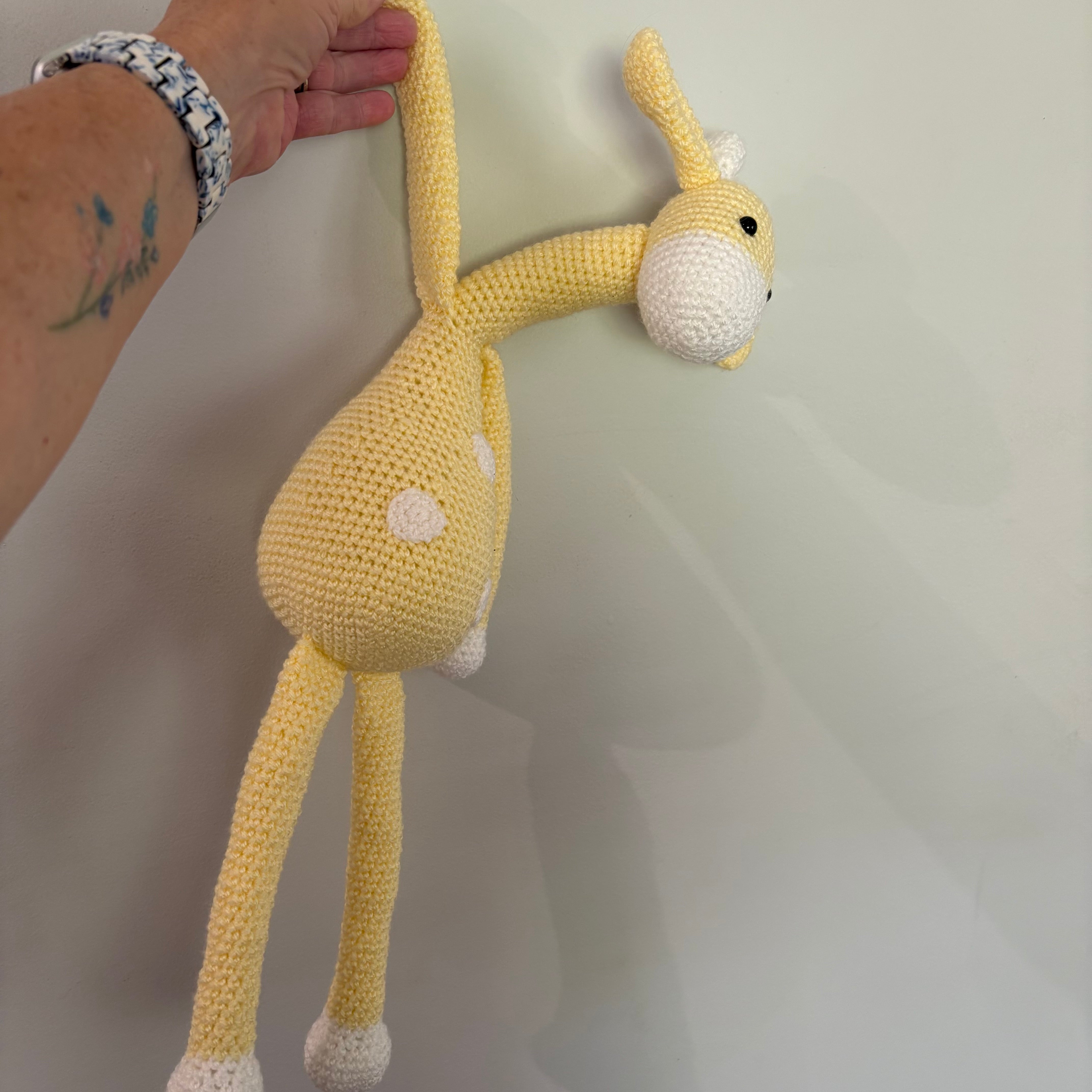Long legged goofy giraffe crochet soft toy