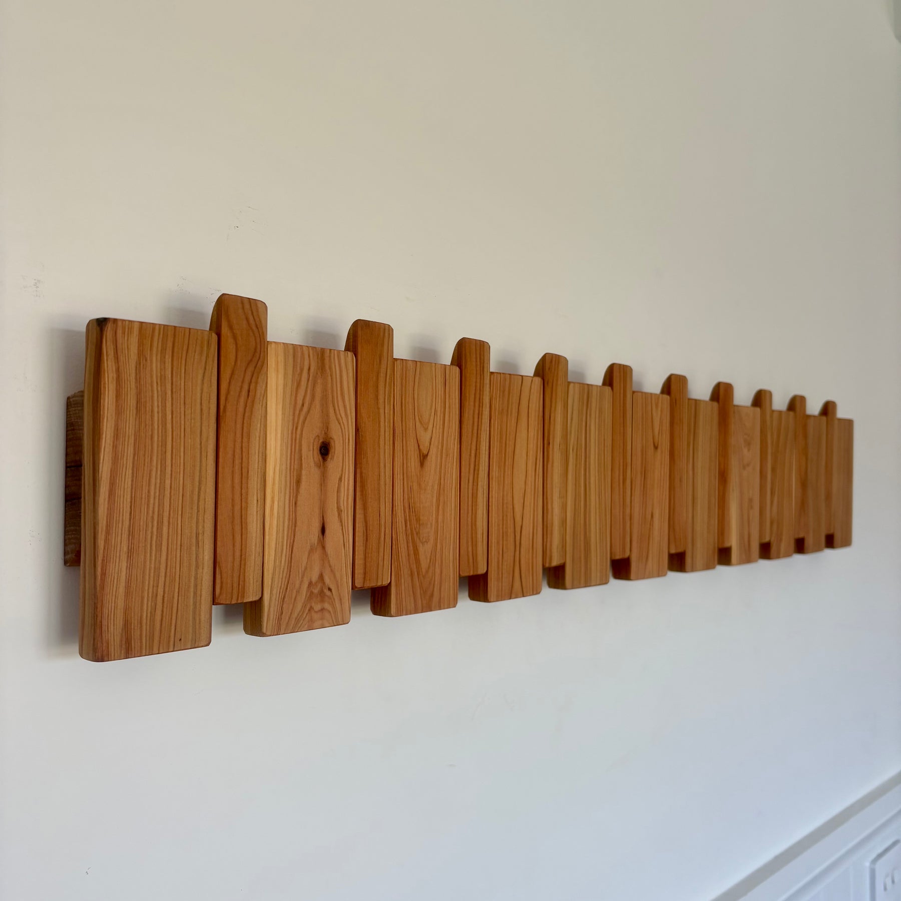 Cypress piano style coat rack extra wide