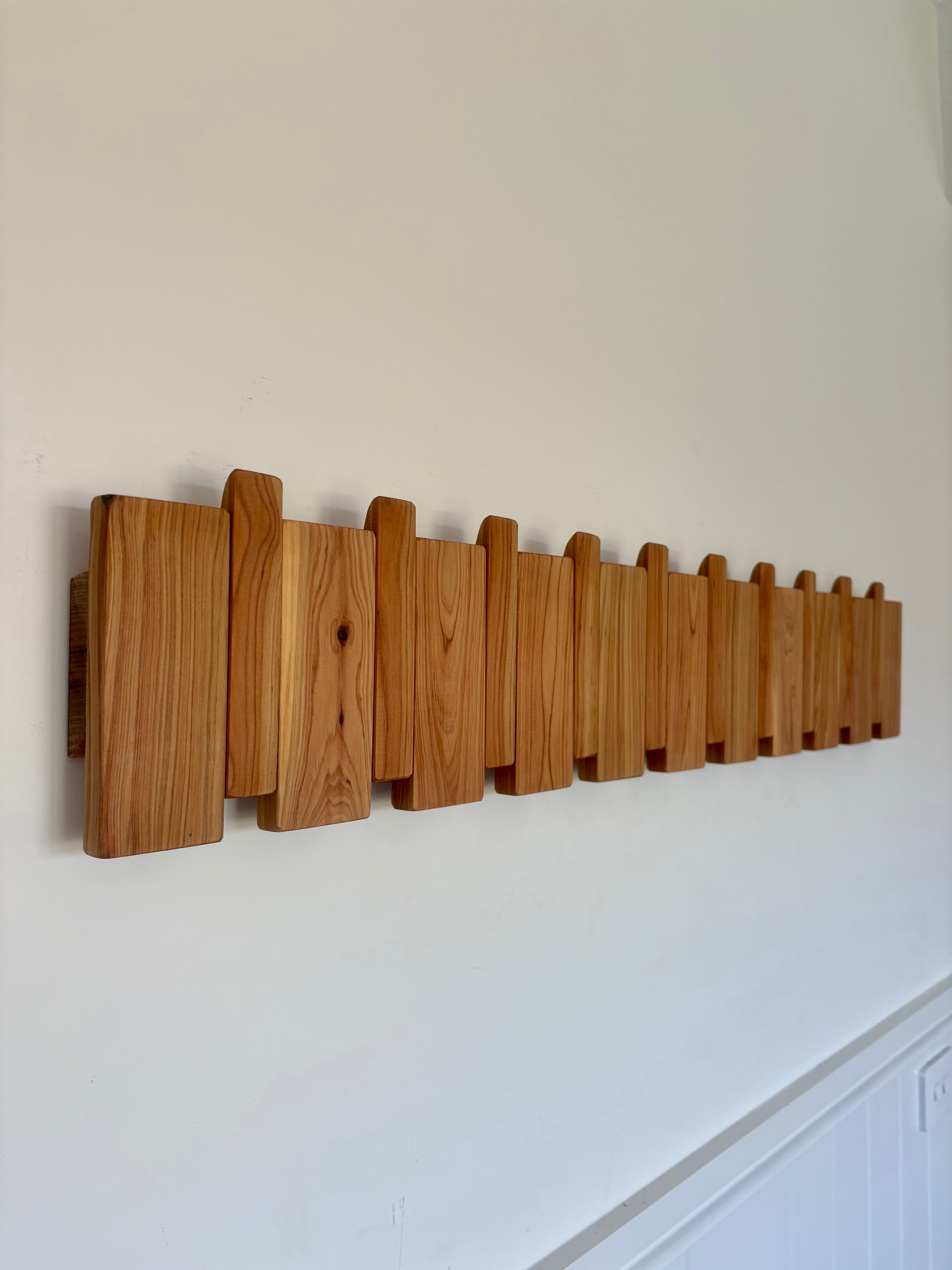 Cypress piano style coat rack extra wide
