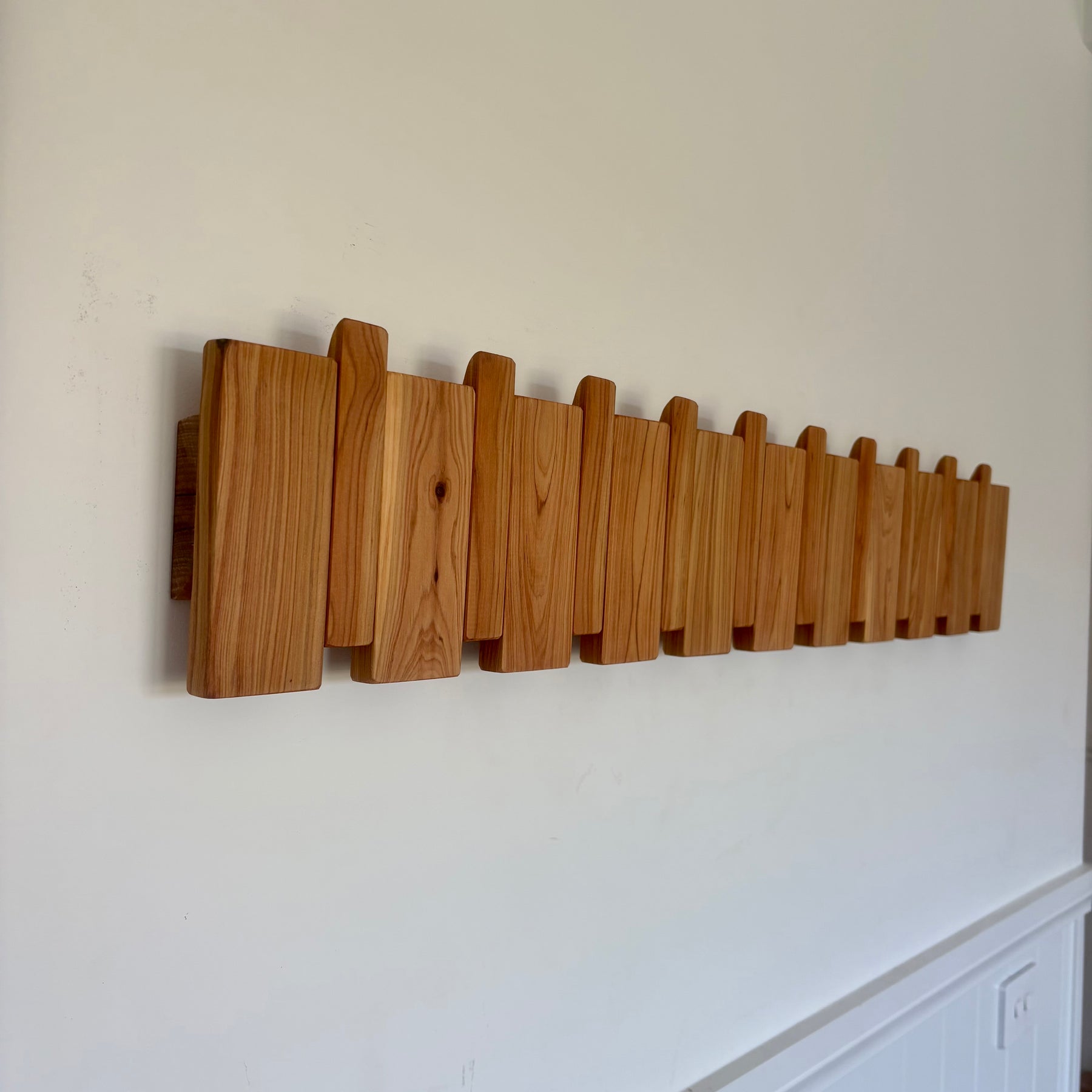 Cypress piano style coat rack extra wide