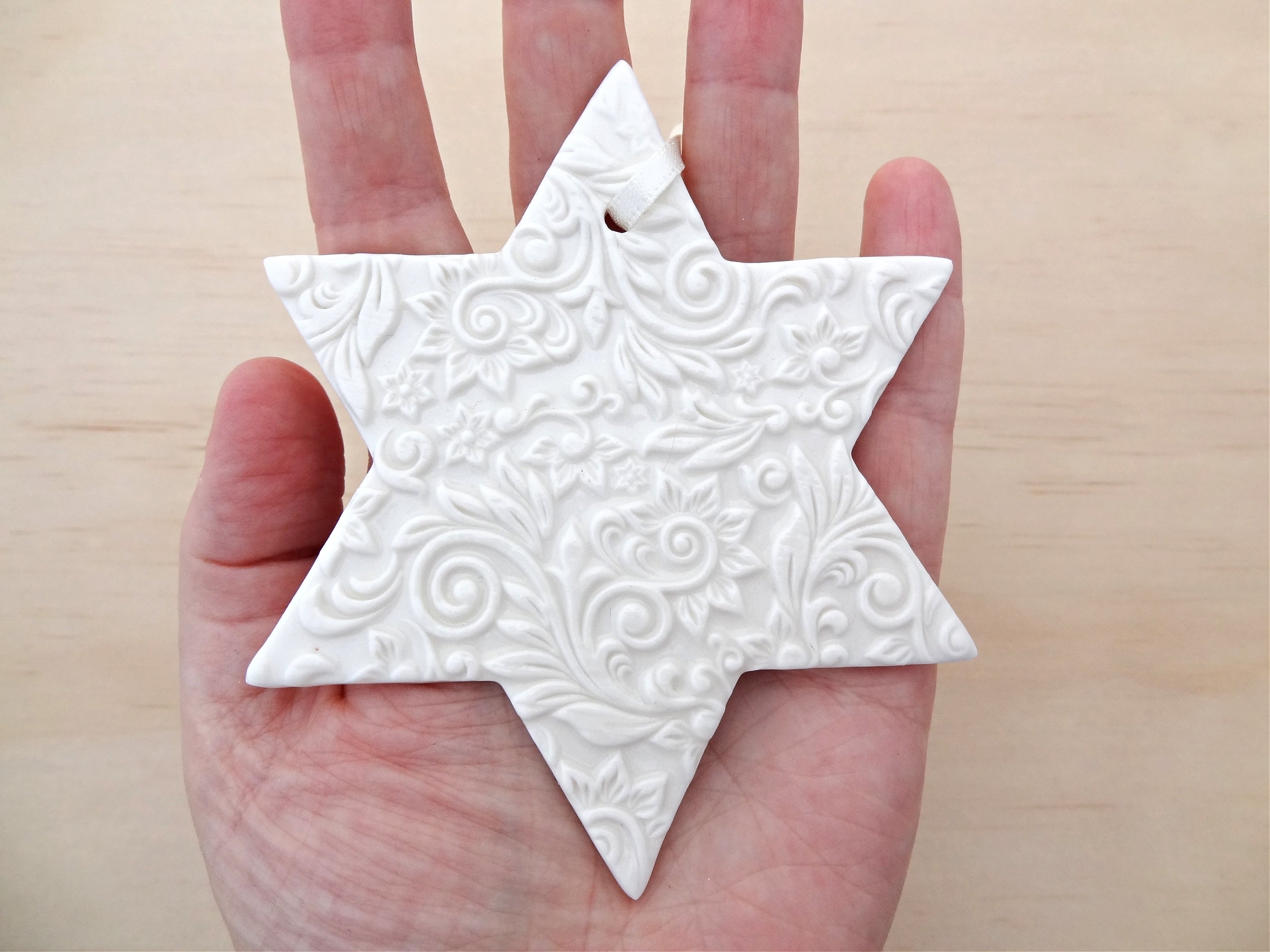 Personalised ceramic star ornament. Christmas decoration with custom wording