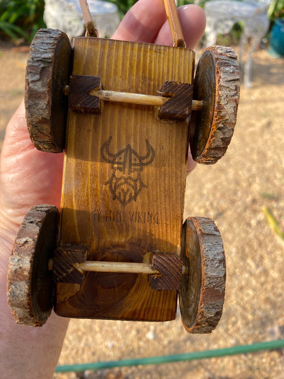 Handmade wooden cow and wagon