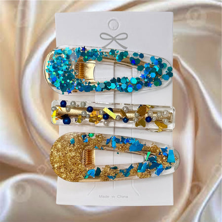 A Set Of Three Blue Barrettes