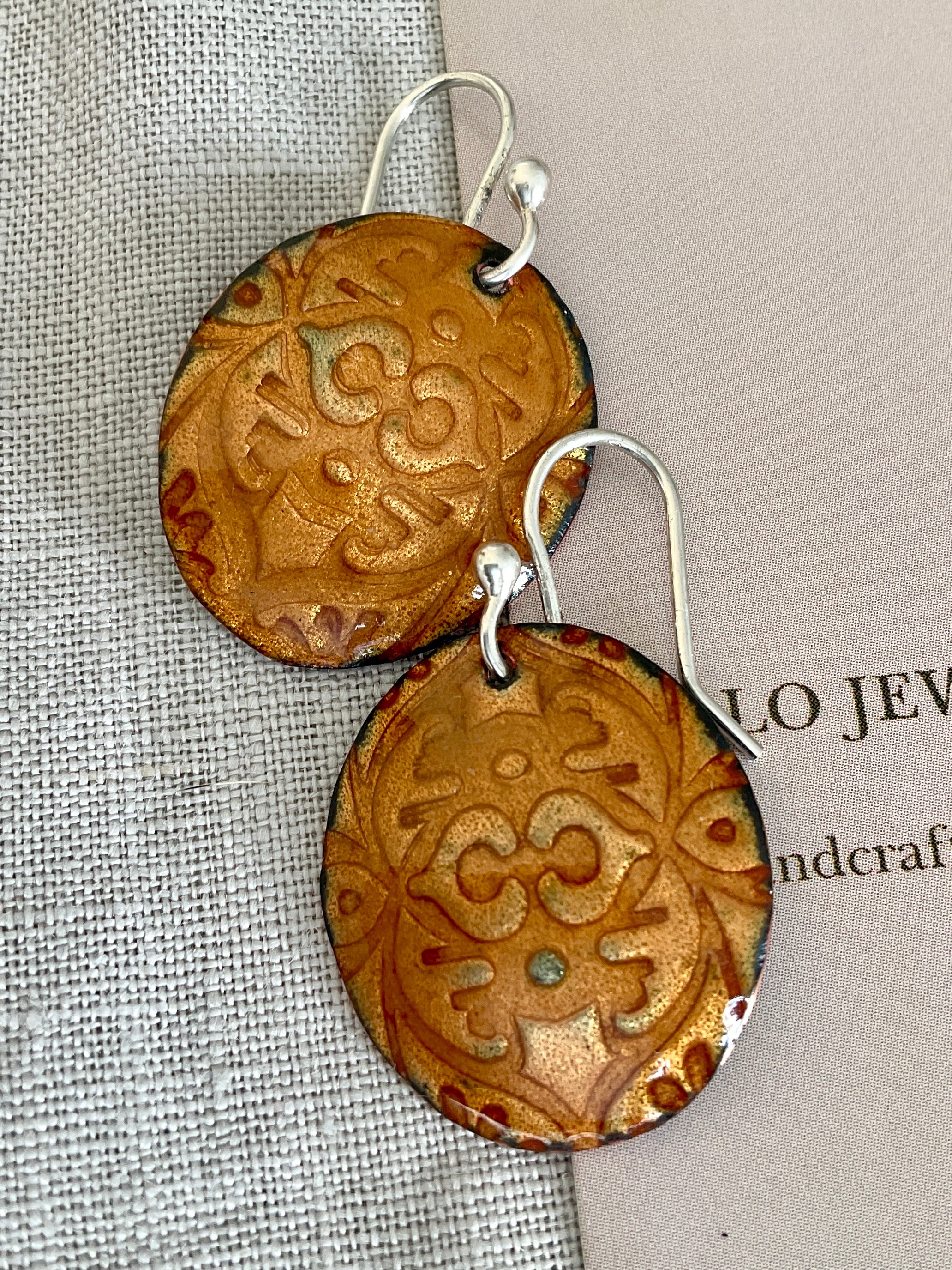 Gold embossed enamel earrings. Handmade