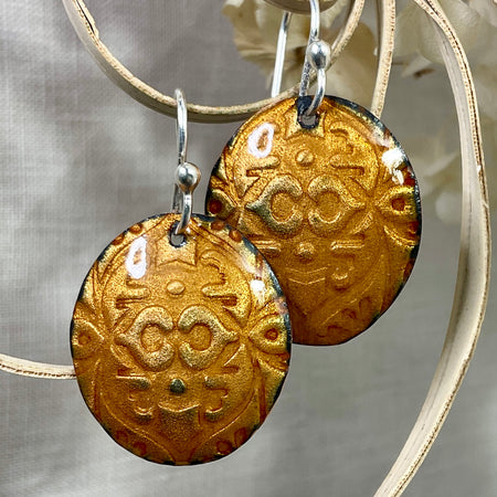 Gold embossed enamel earrings. Handmade